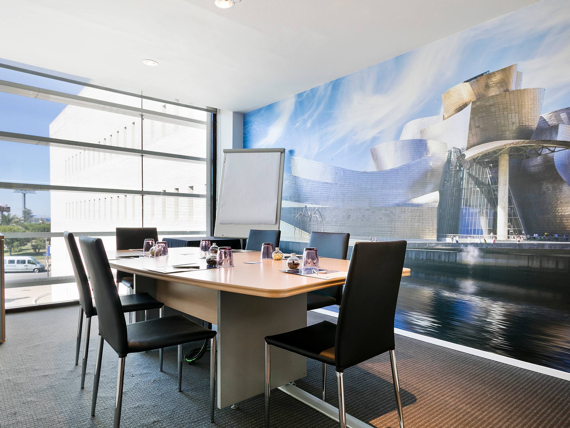 a room with a table and chairs