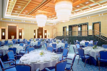 a large room with tables and chairs