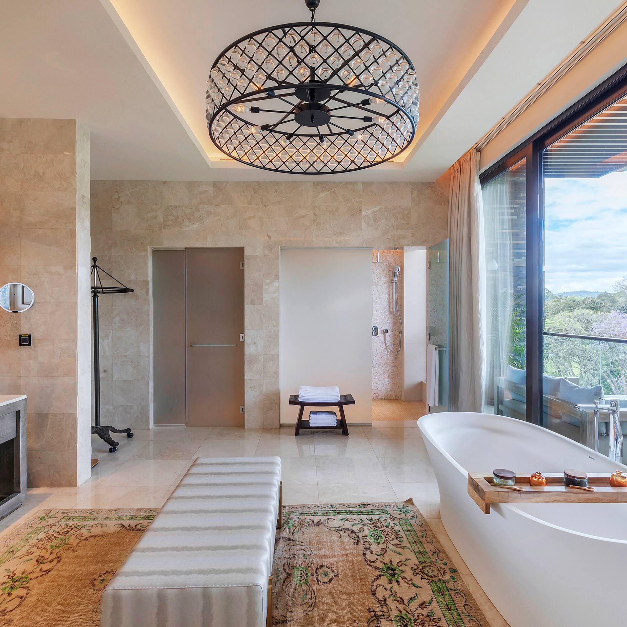 a bathroom with a tub and a fireplace