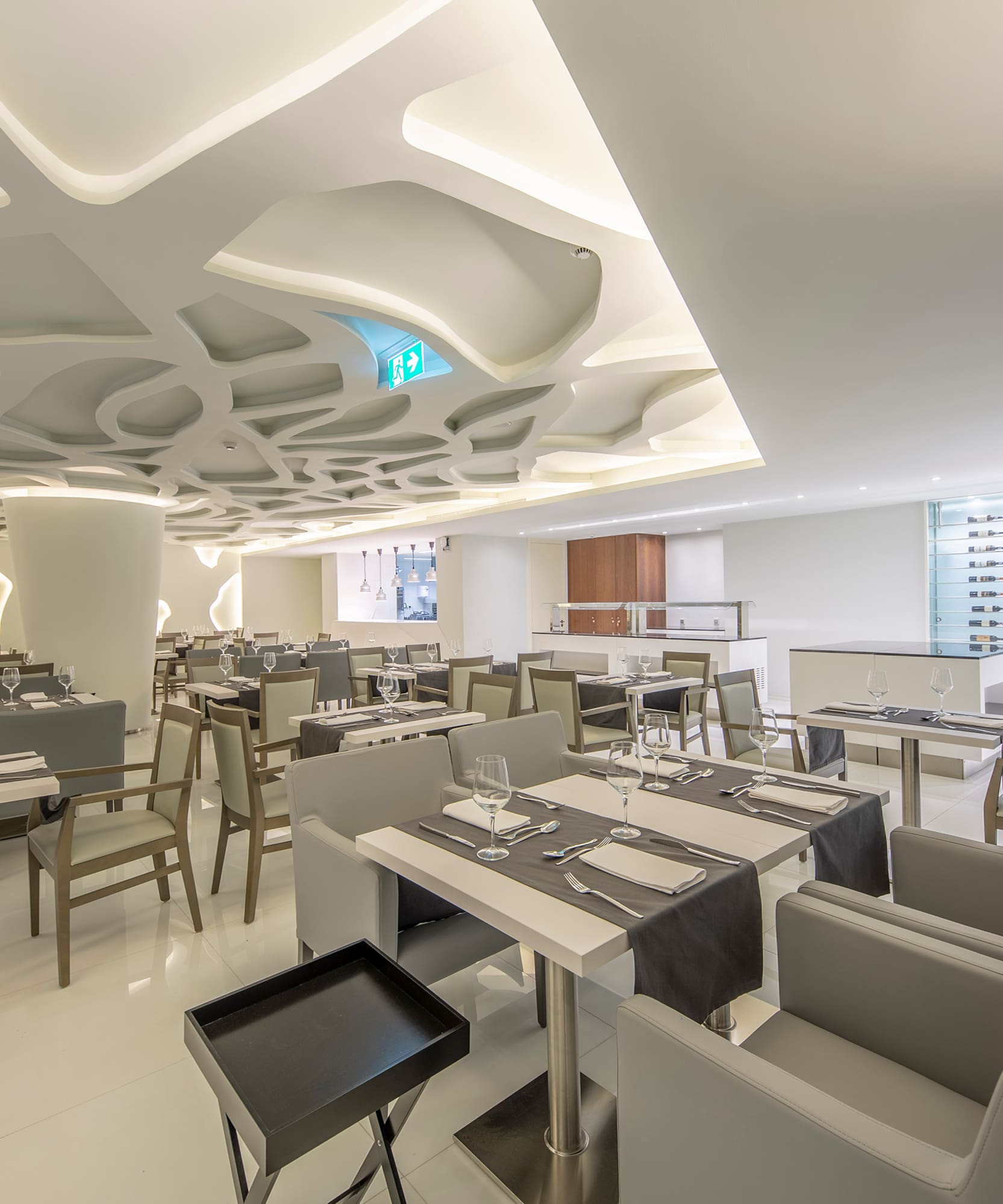 a restaurant with tables and chairs