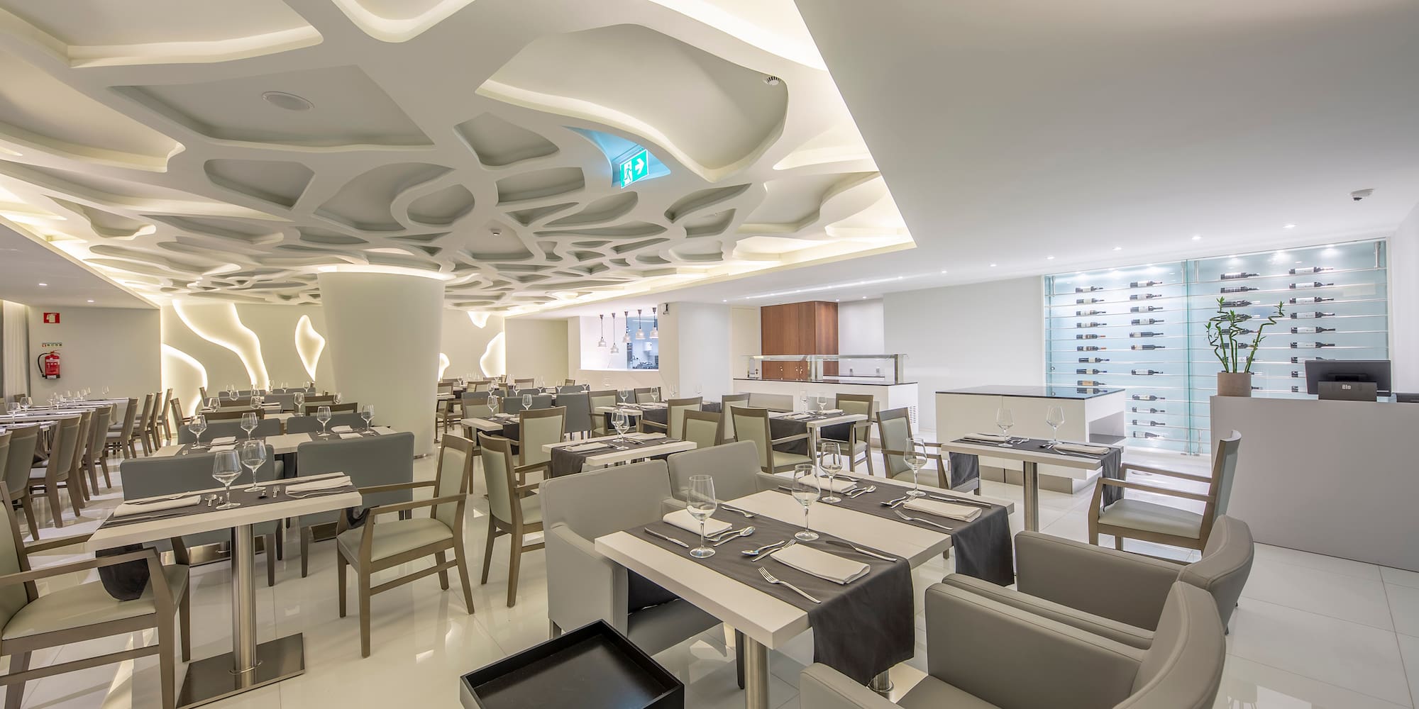 a restaurant with tables and chairs