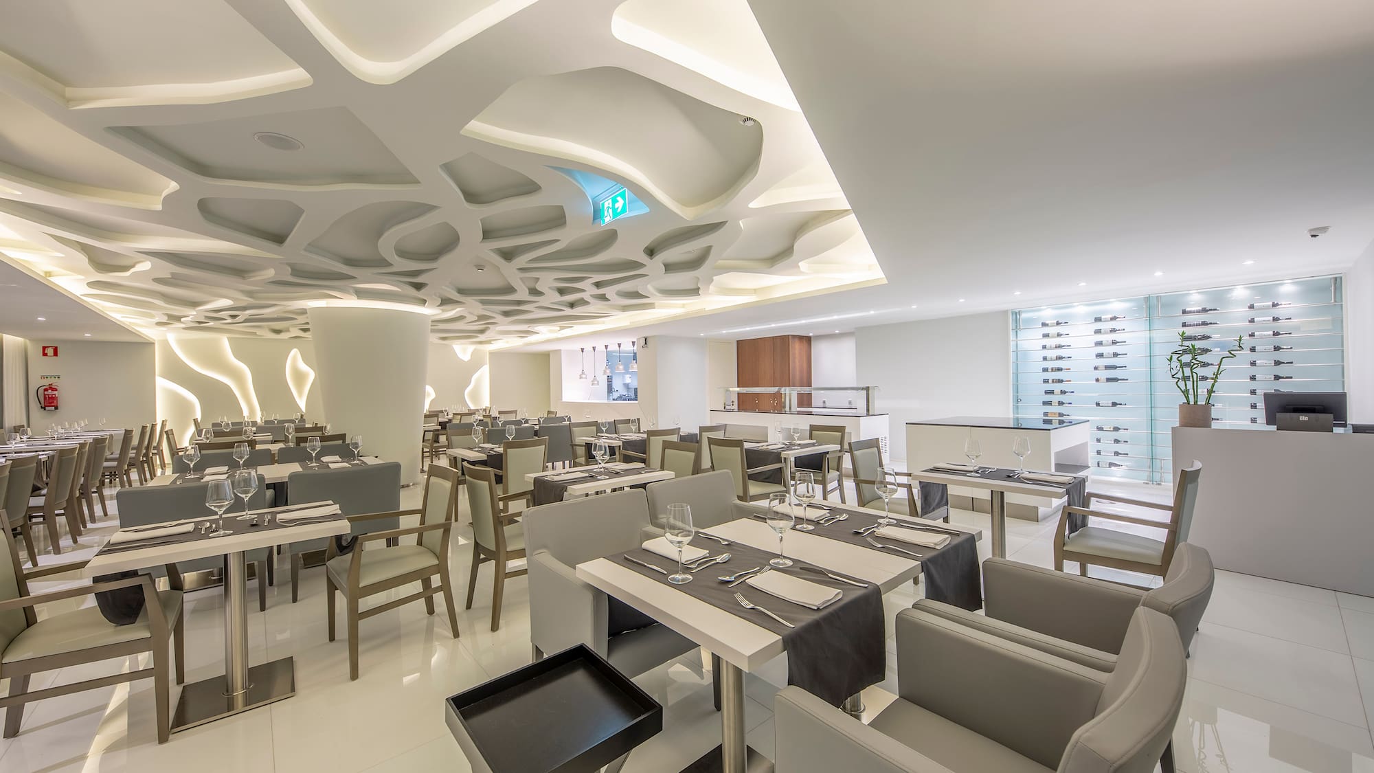 a restaurant with tables and chairs