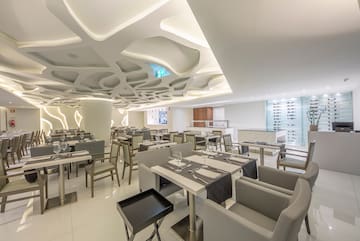 a restaurant with tables and chairs