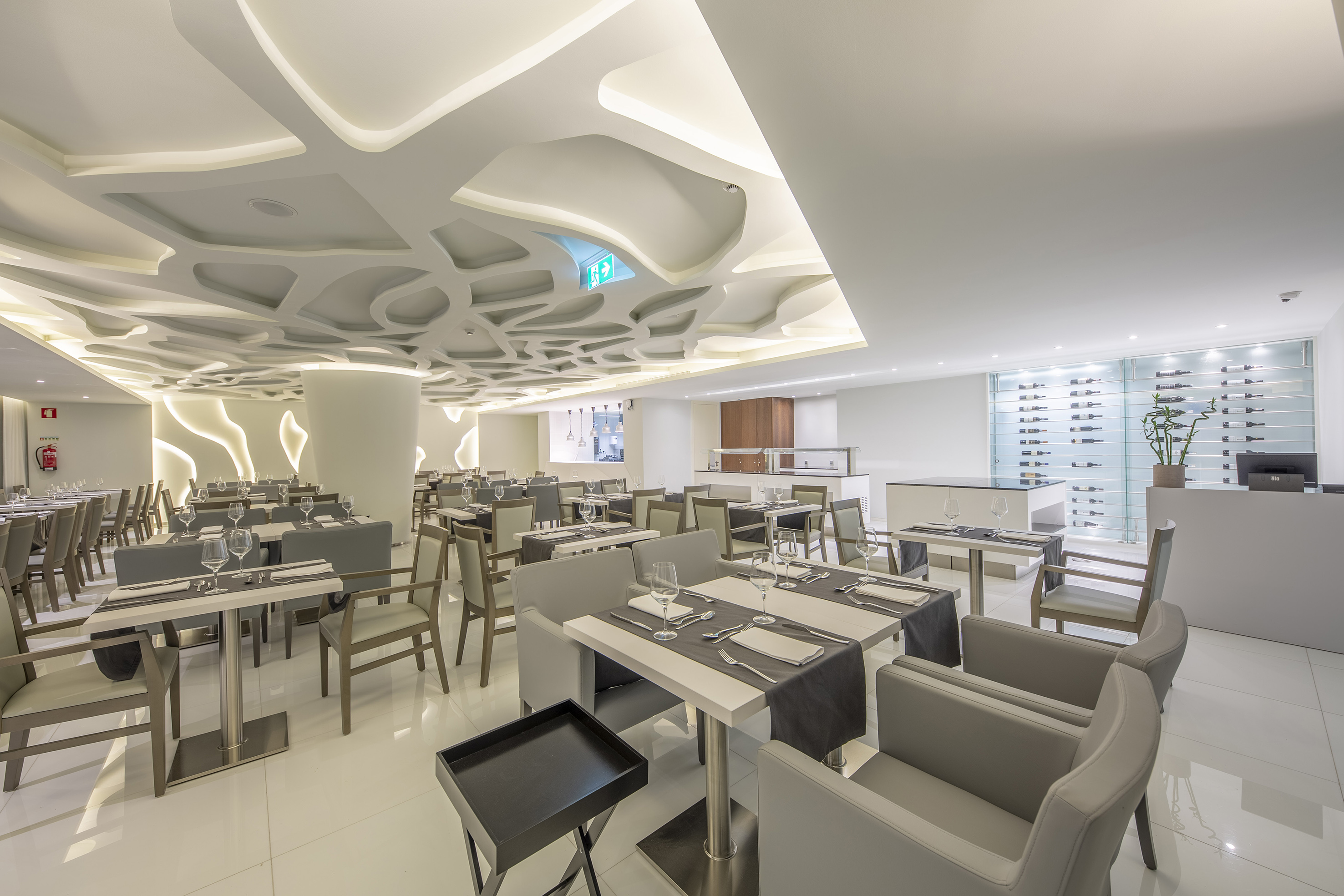 a restaurant with tables and chairs