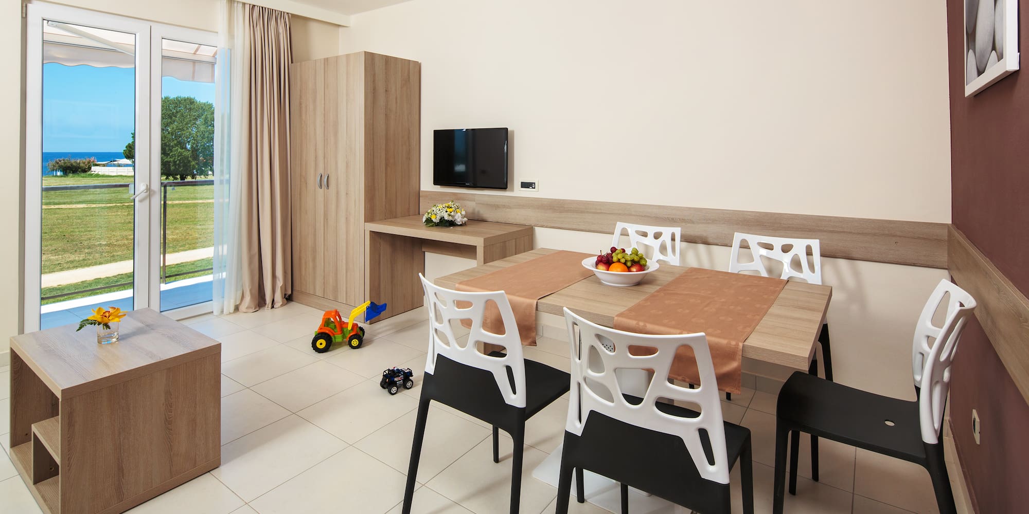 a room with a table and chairs