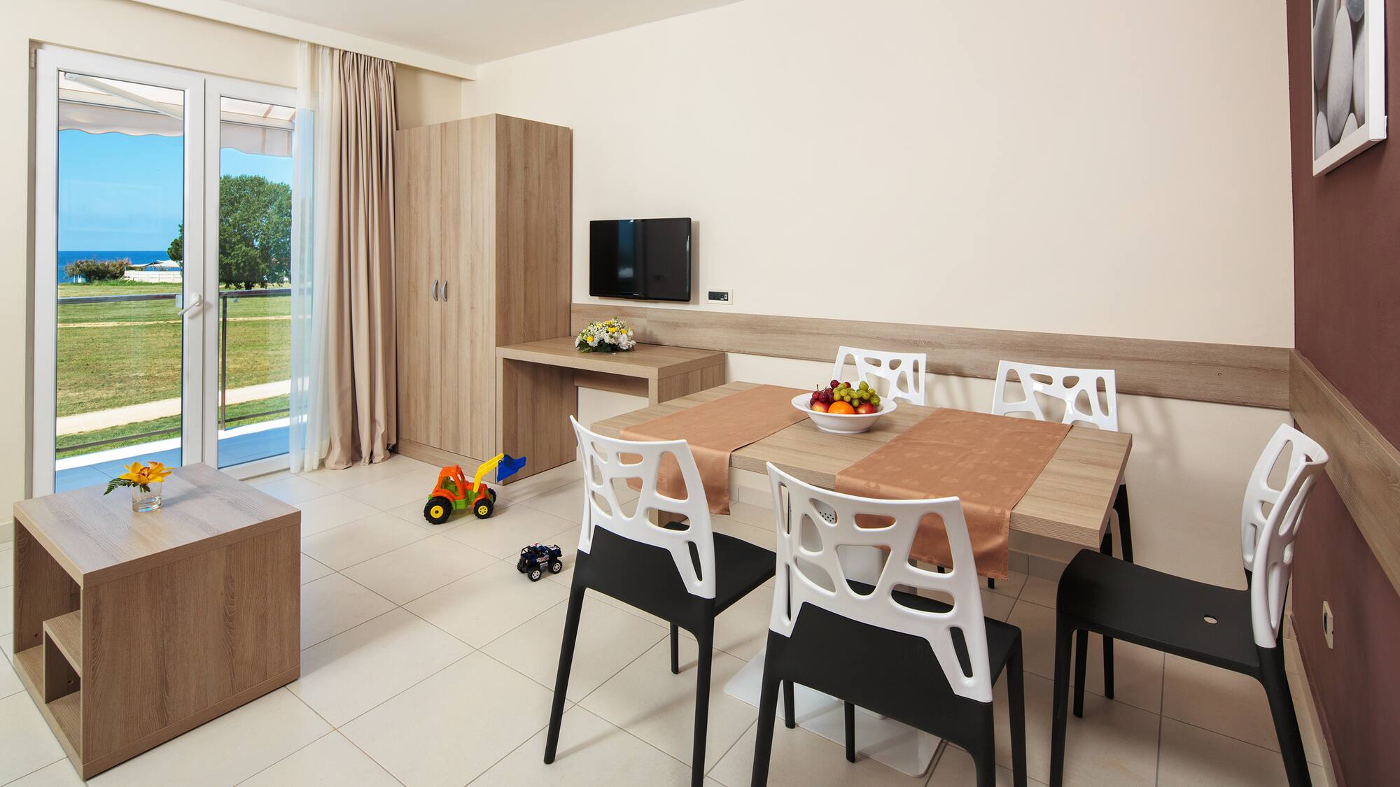 a room with a table and chairs