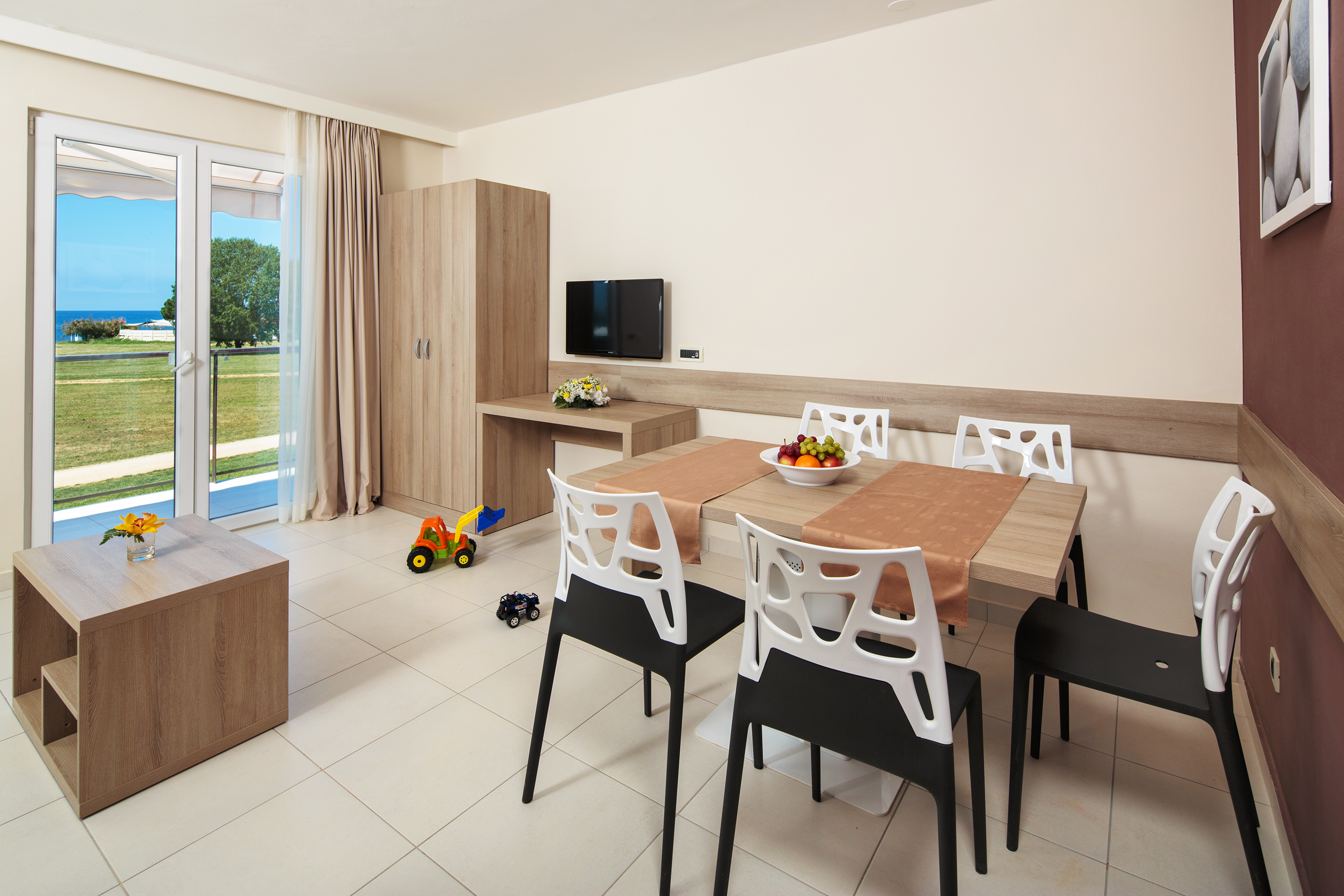 a room with a table and chairs