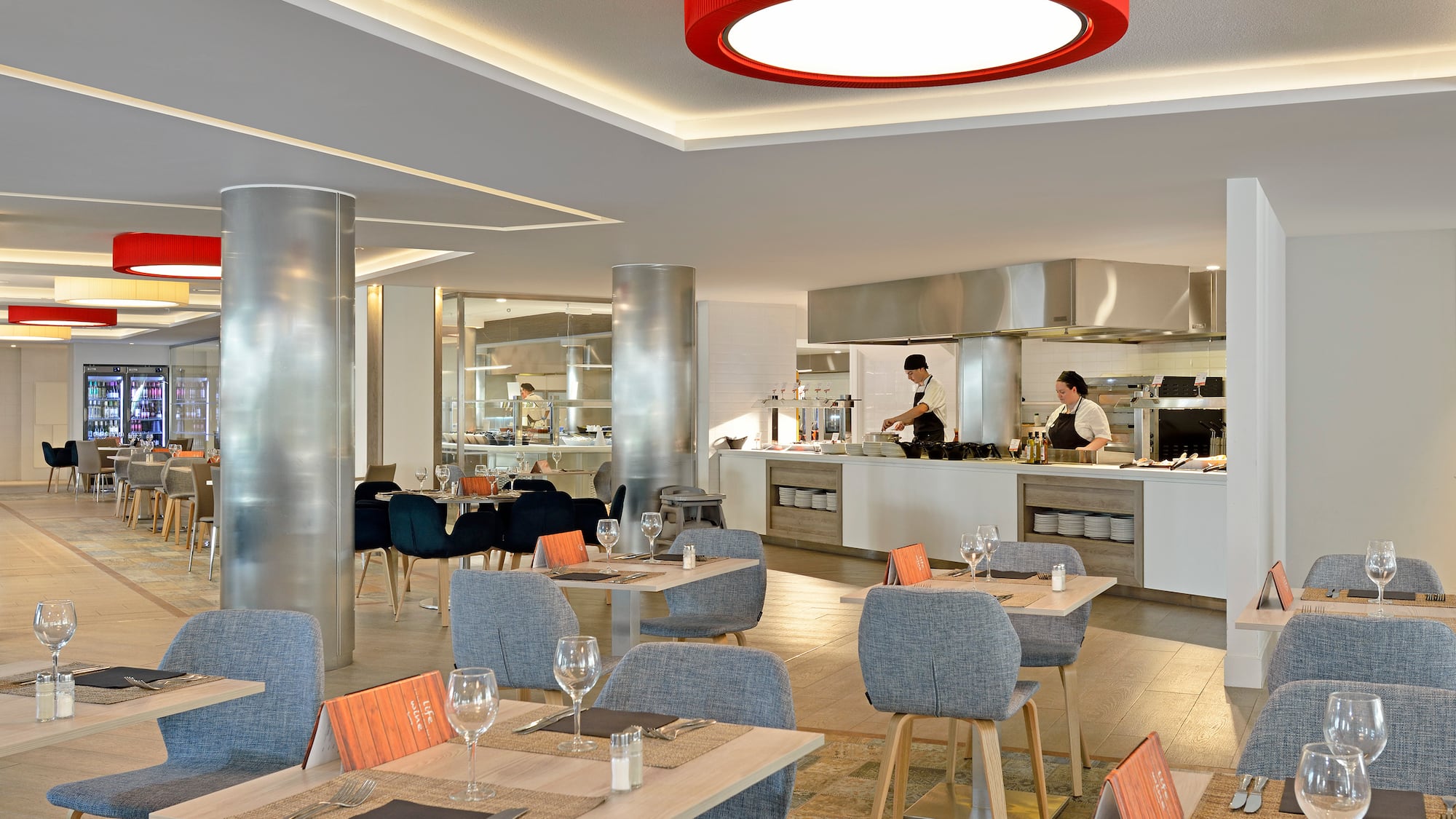 a restaurant with tables and chairs