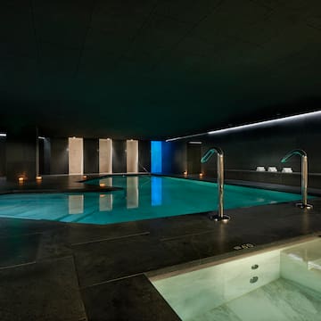 a indoor pool with lights