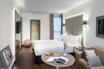 a room with a bed and a table