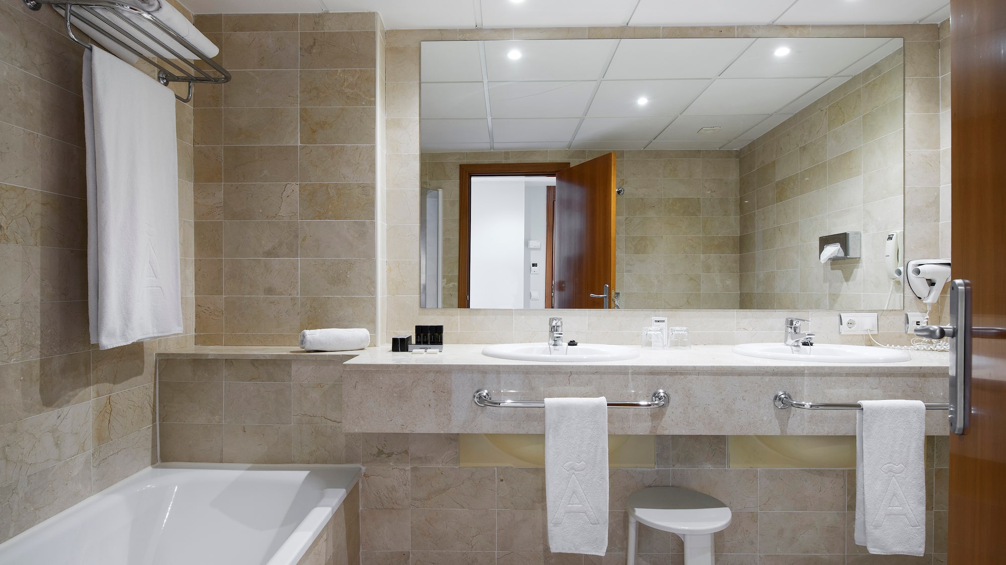 a bathroom with a sink and bathtub