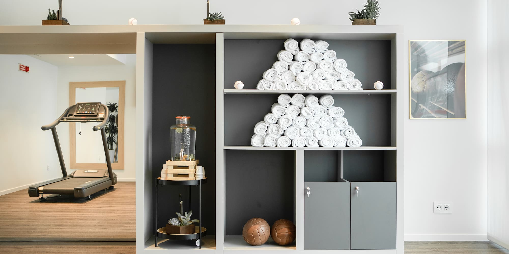 a shelf with towels on it