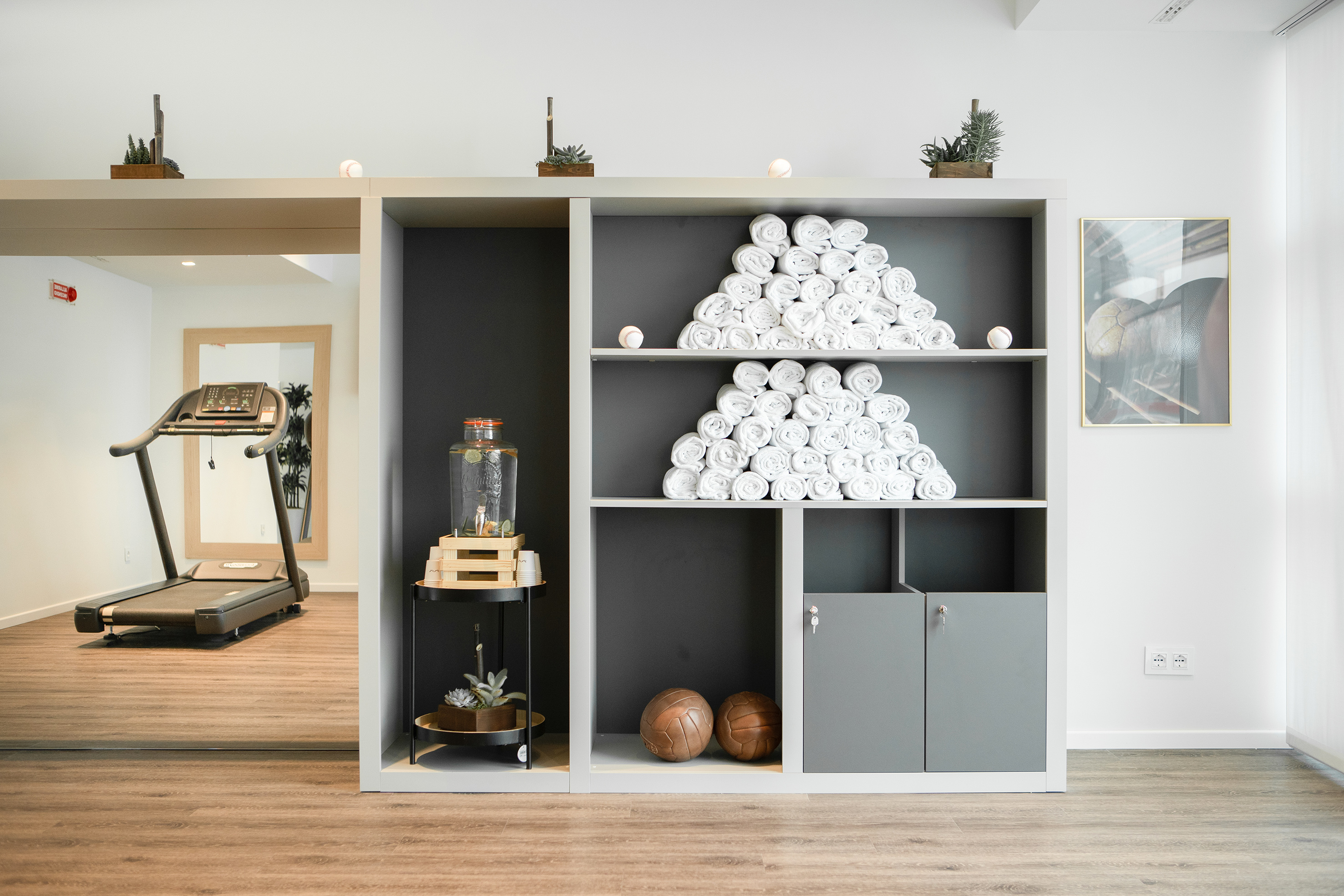 a shelf with towels on it