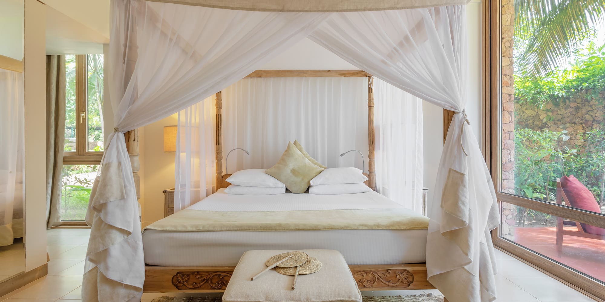 a bed with a canopy over it