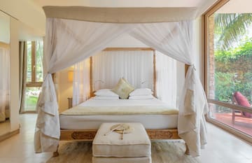 a bed with a canopy over it