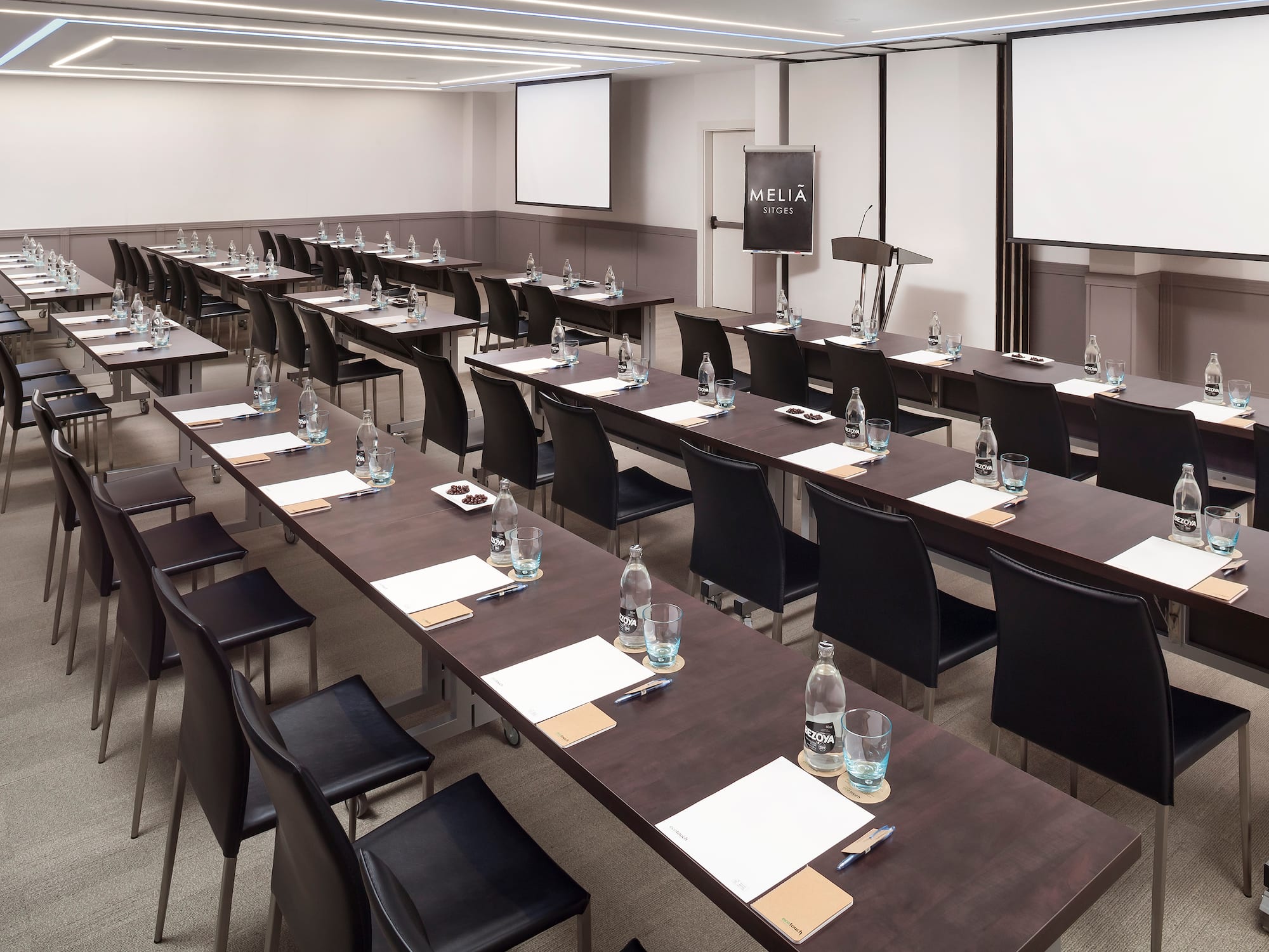 a room with tables and chairs