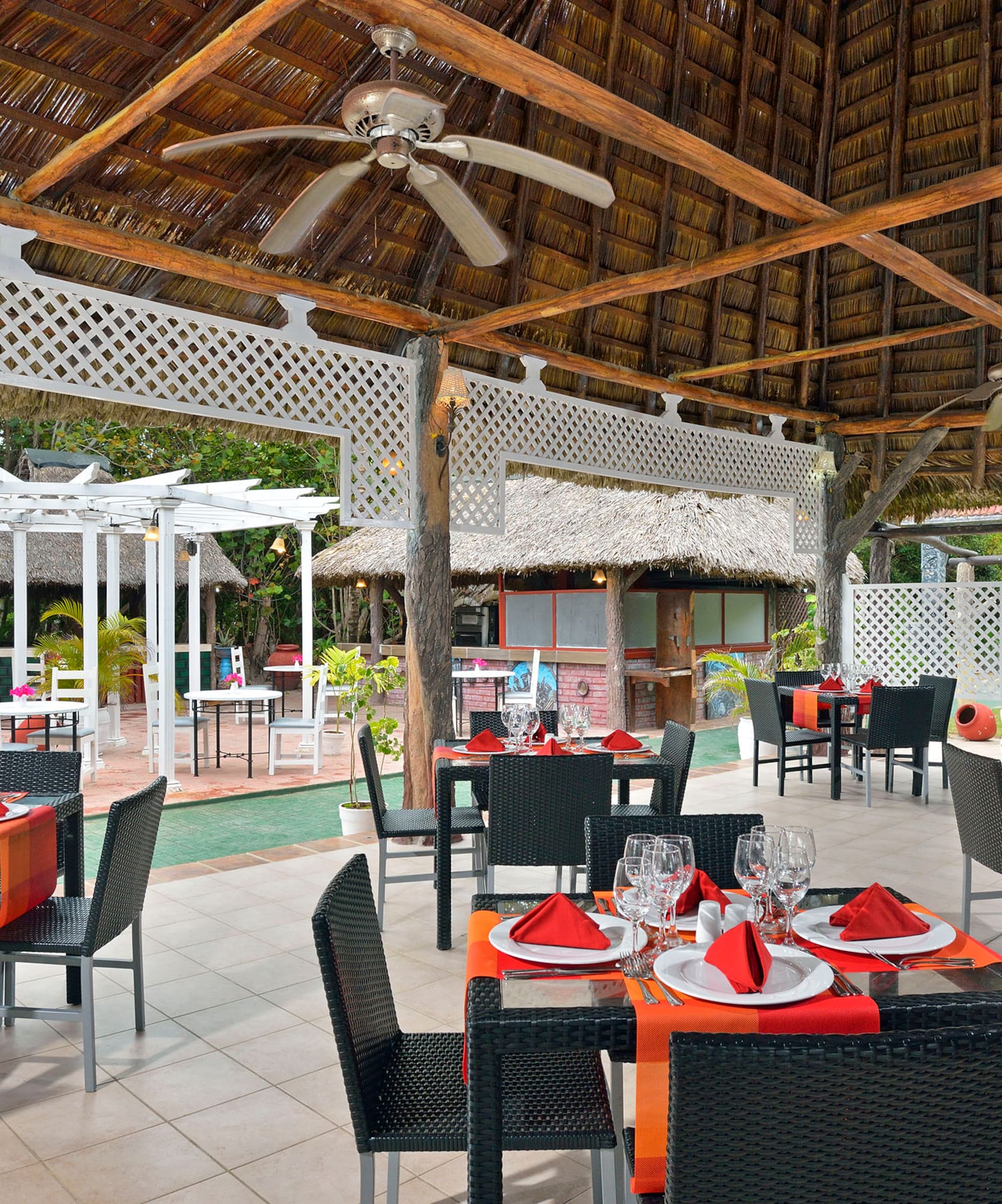 a restaurant with tables and chairs