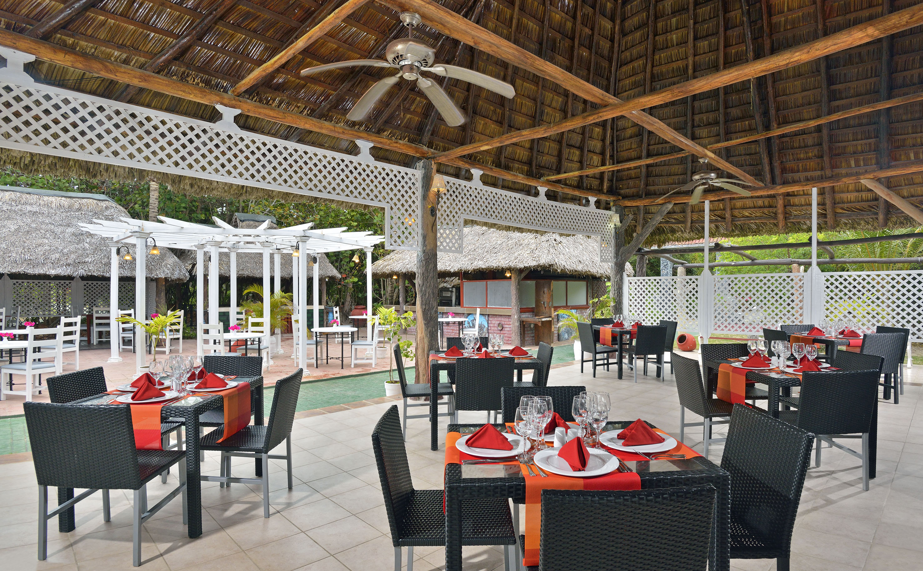 a restaurant with tables and chairs