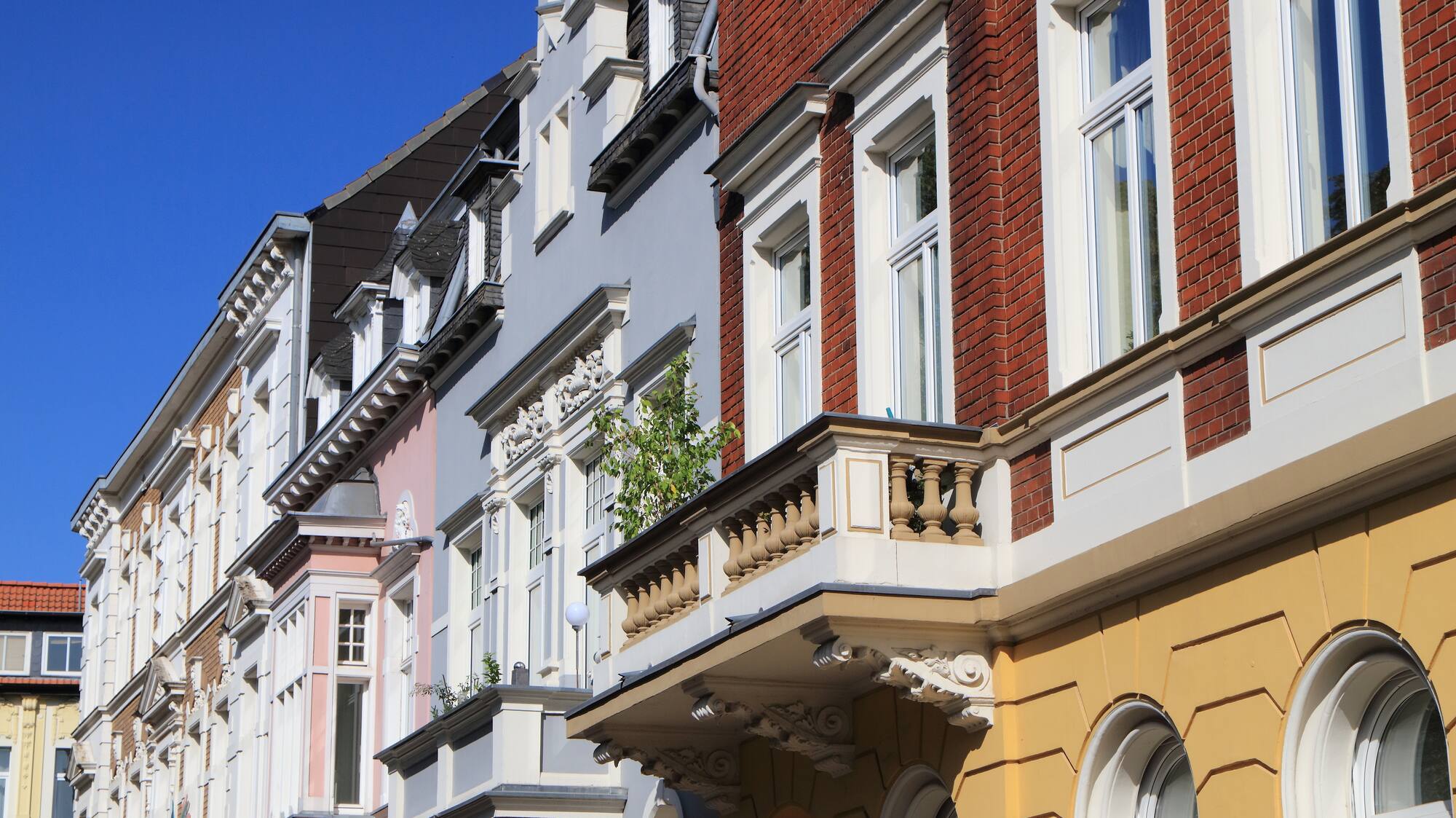 a row of buildings with windows