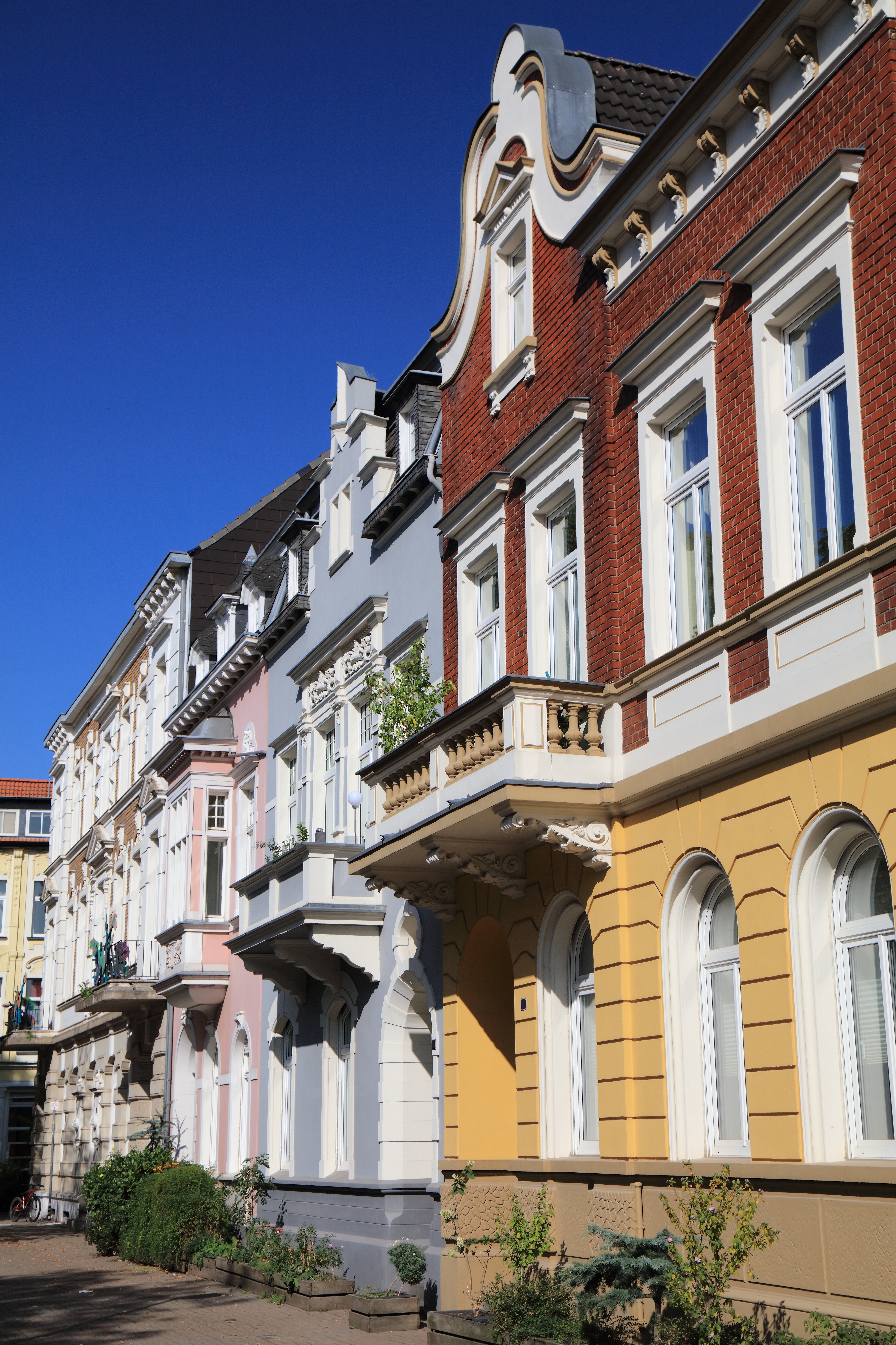 a row of buildings with windows