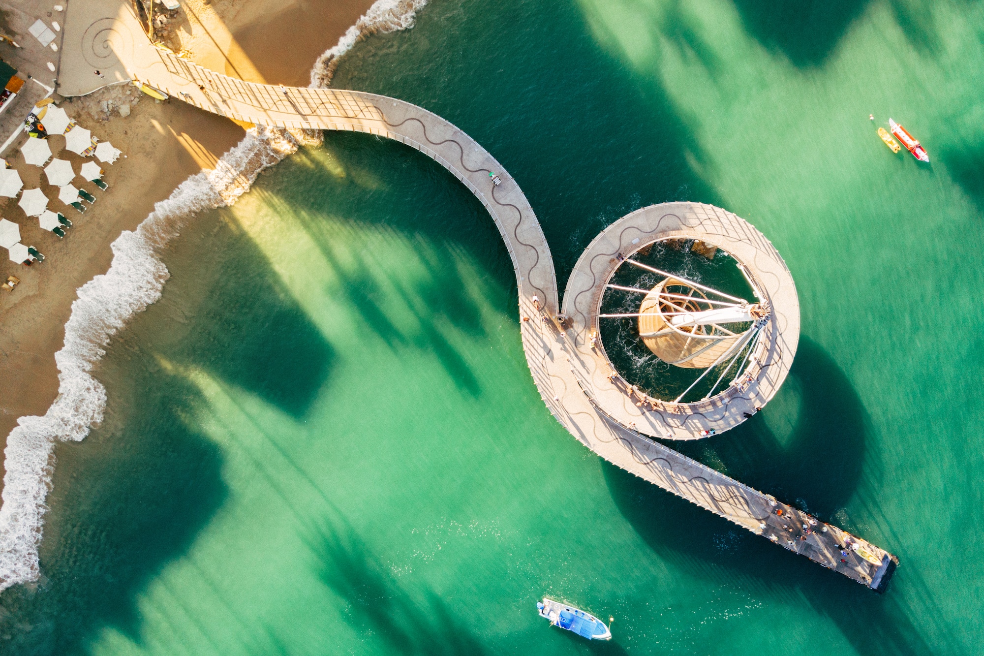 a bridge over water with a boat