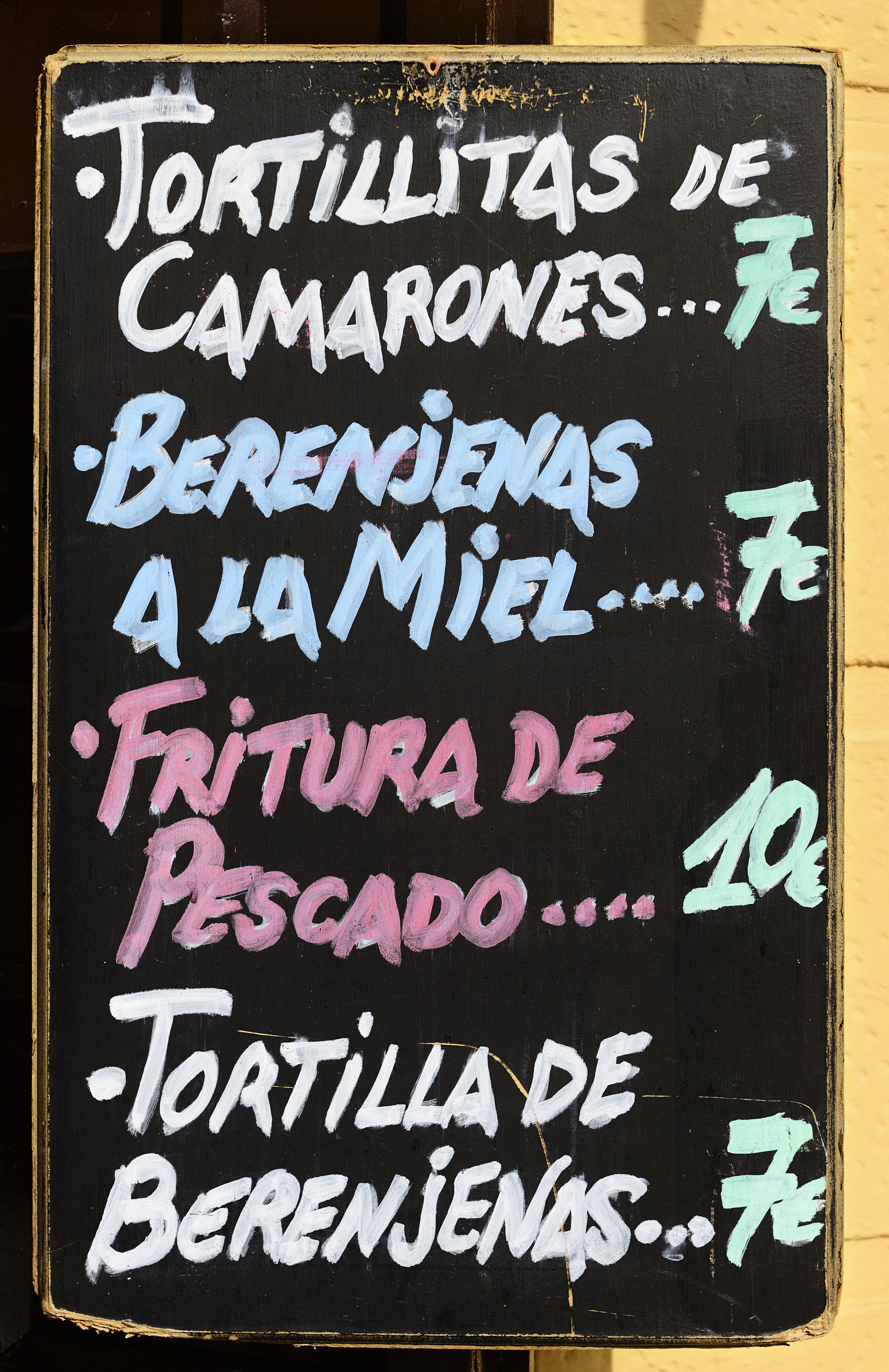 a sign with writing on it