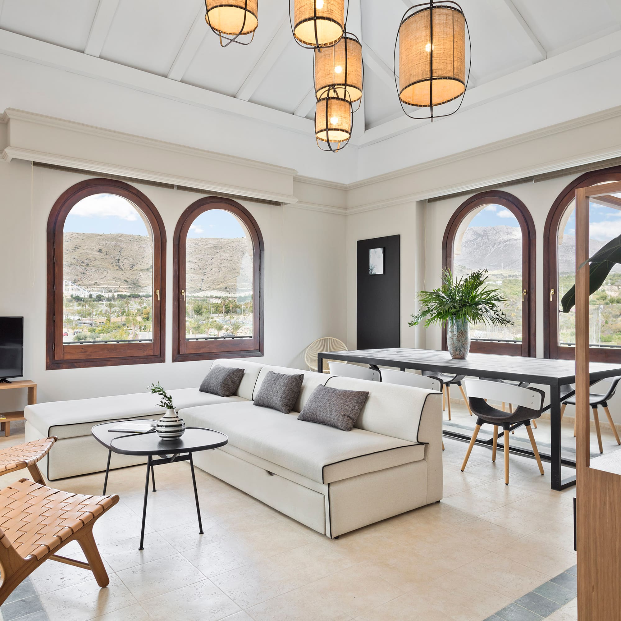 a living room with a couch and a table