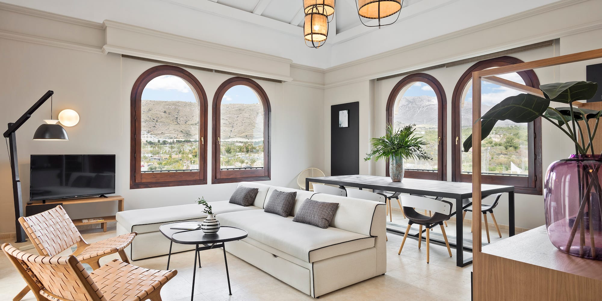 a living room with a couch and a table