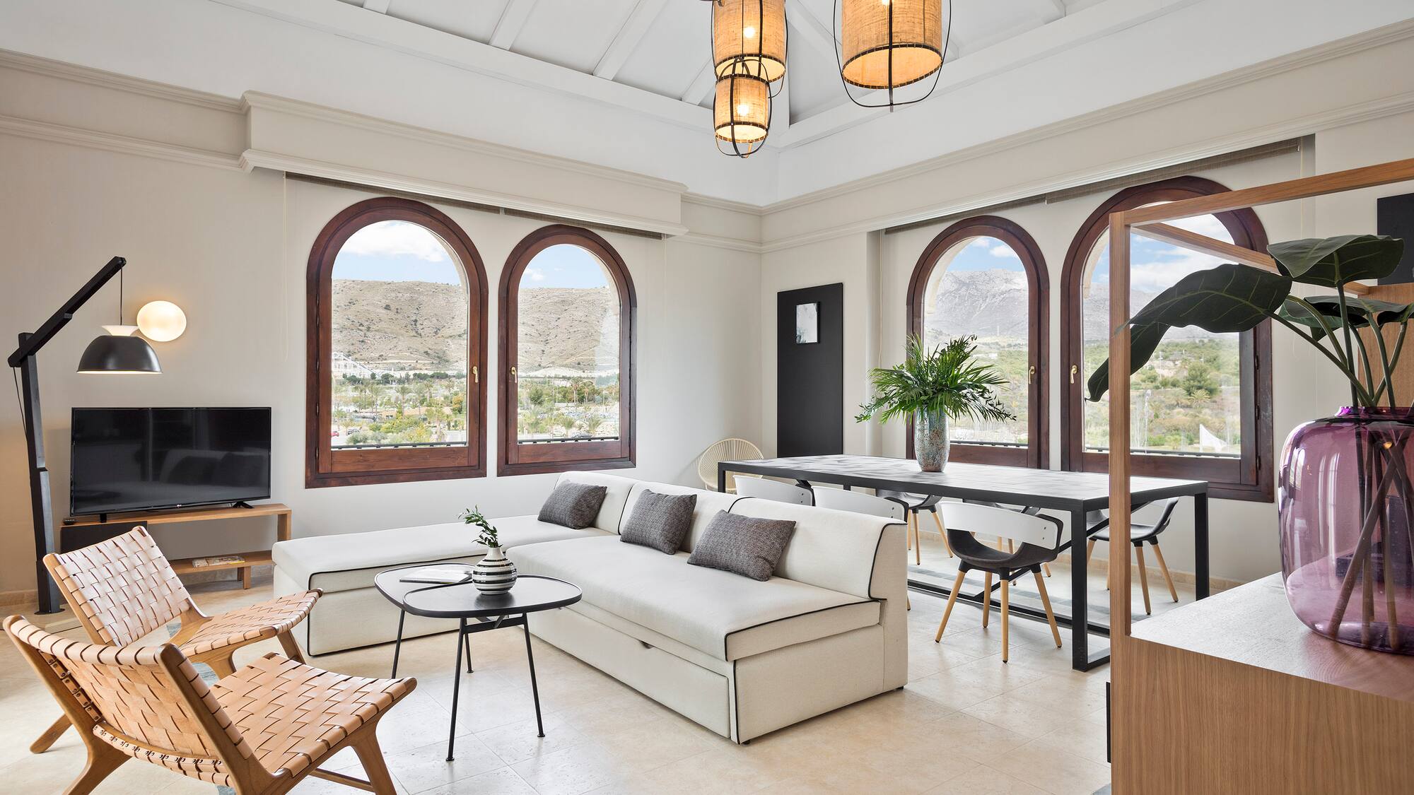 a living room with a couch and a table