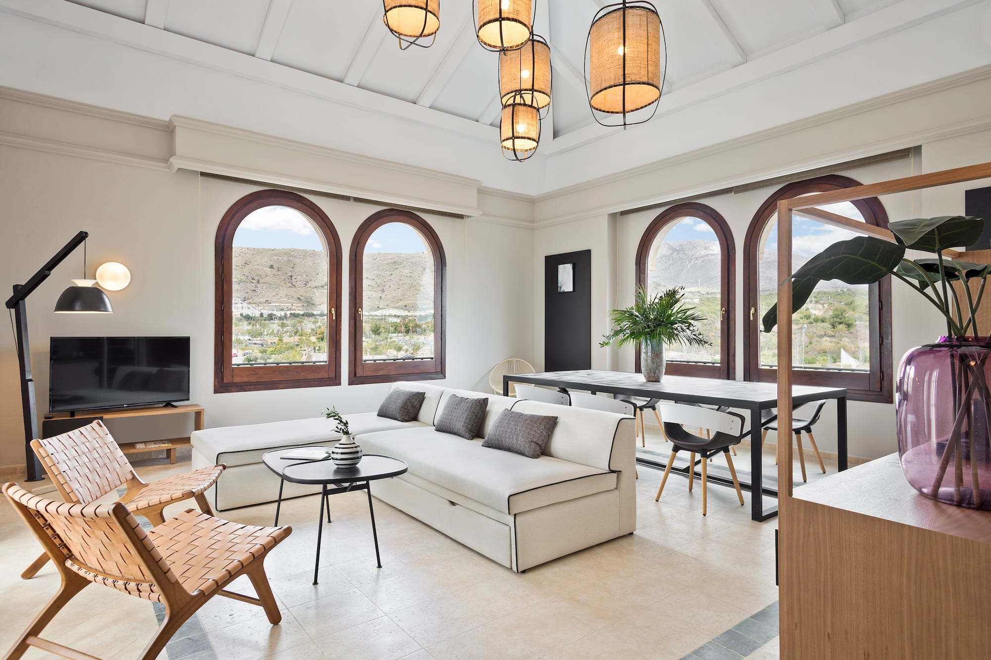 a living room with a couch and a table