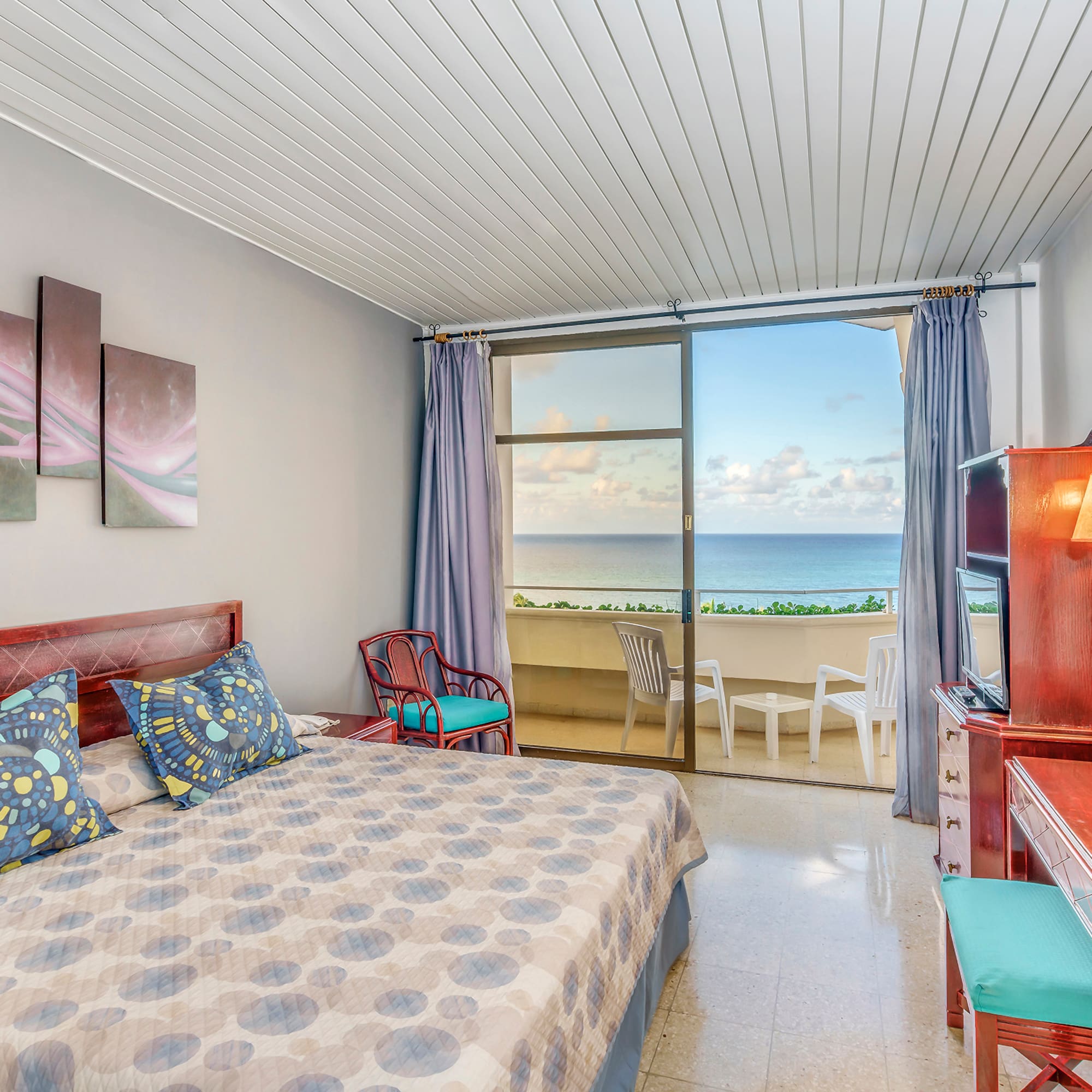 a bedroom with a piano and a bed