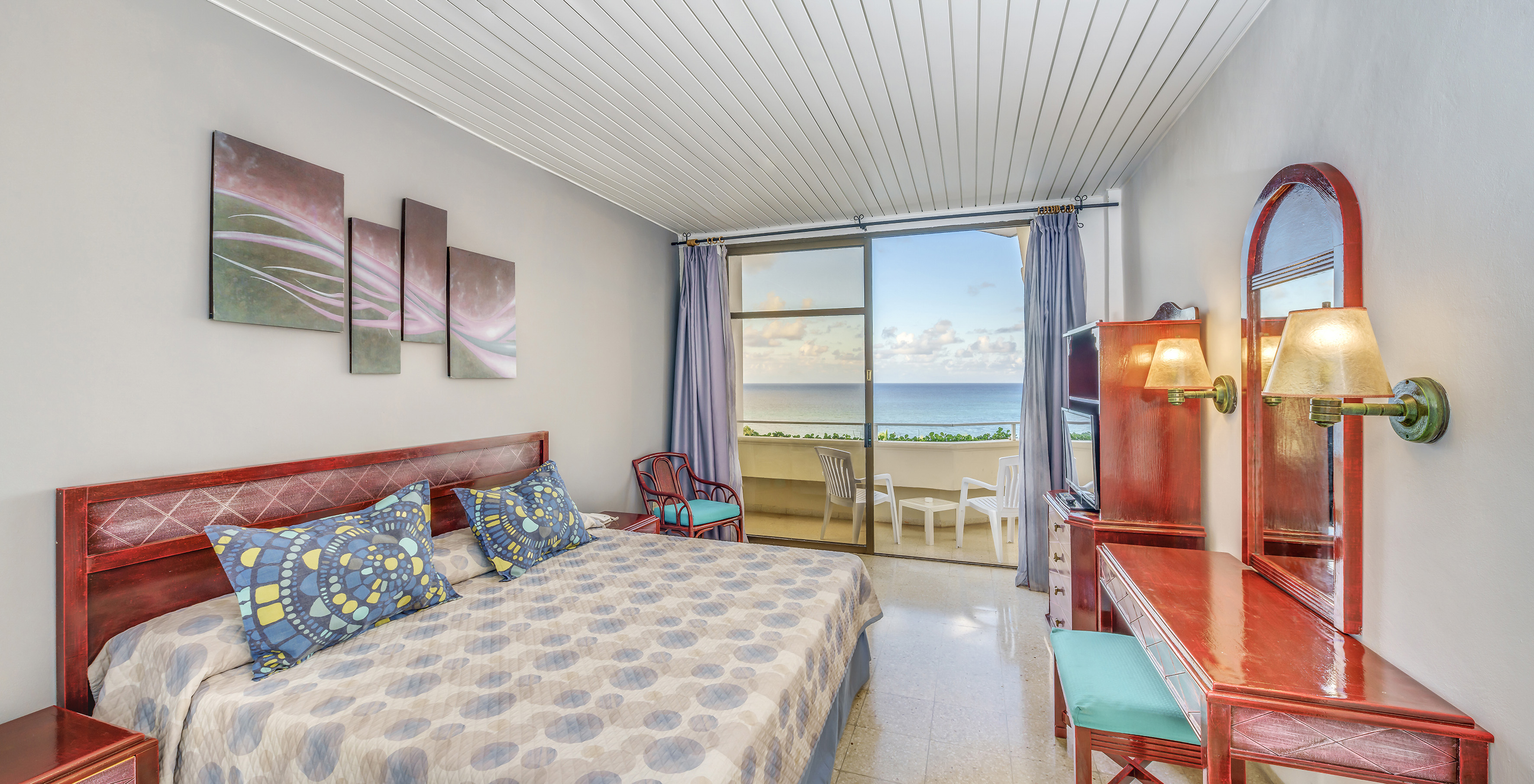 a bedroom with a piano and a bed