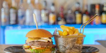 a burger and fries on a plate