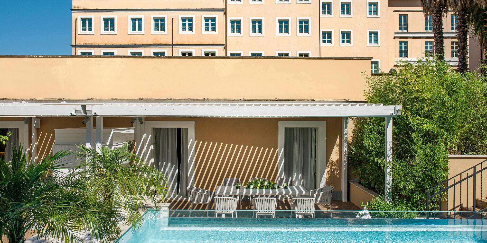 a pool in front of a building