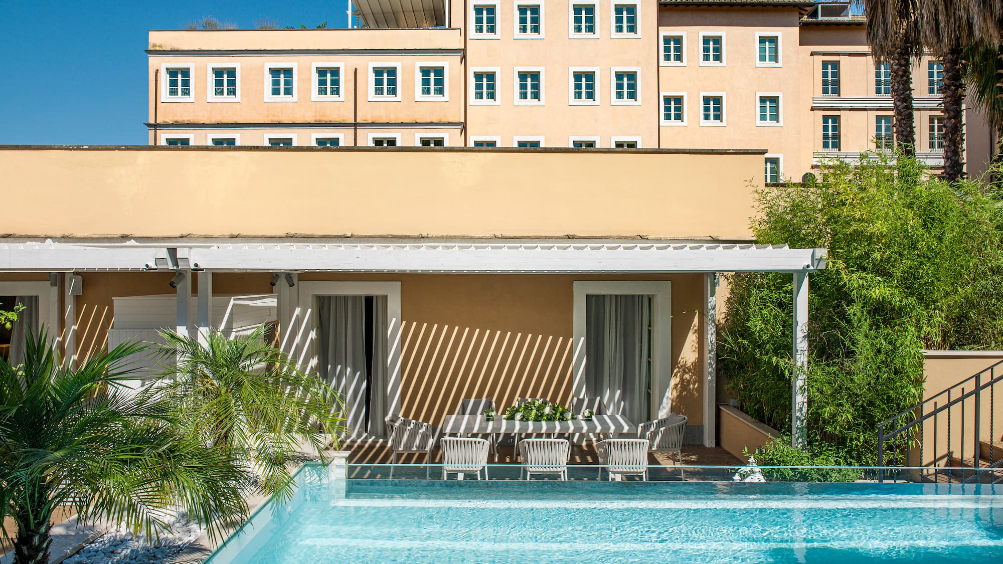 a pool in front of a building