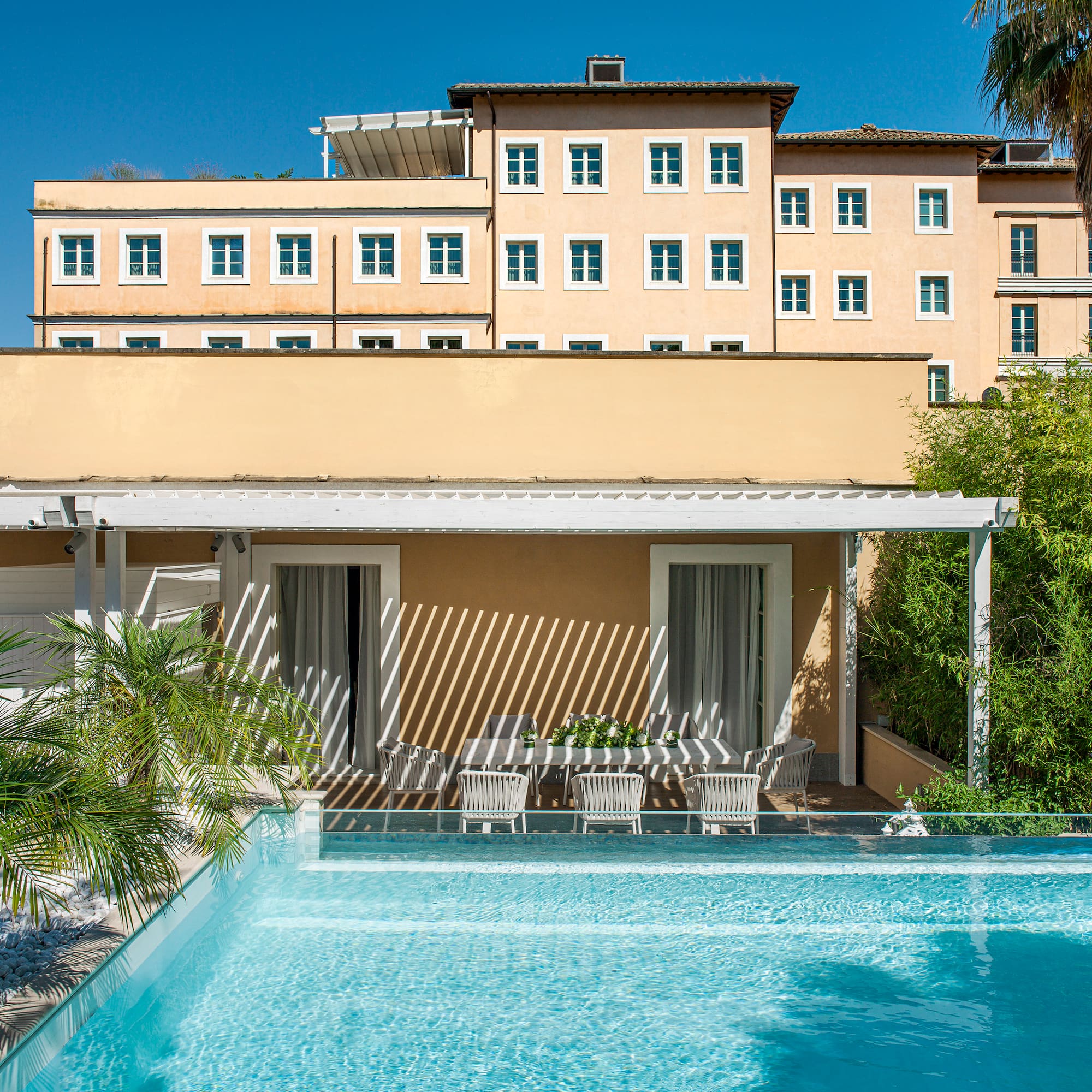 a pool in front of a building