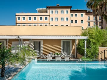 a pool in front of a building