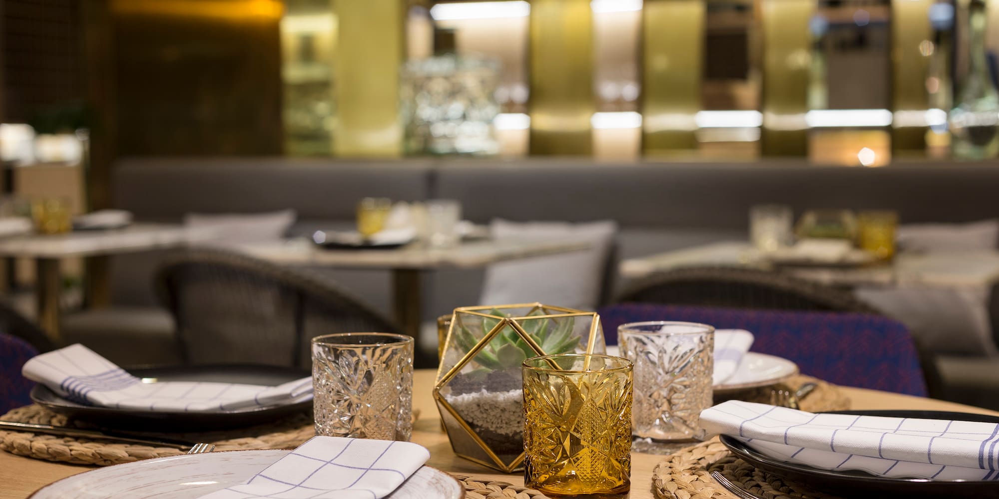 a table with plates and glasses on it