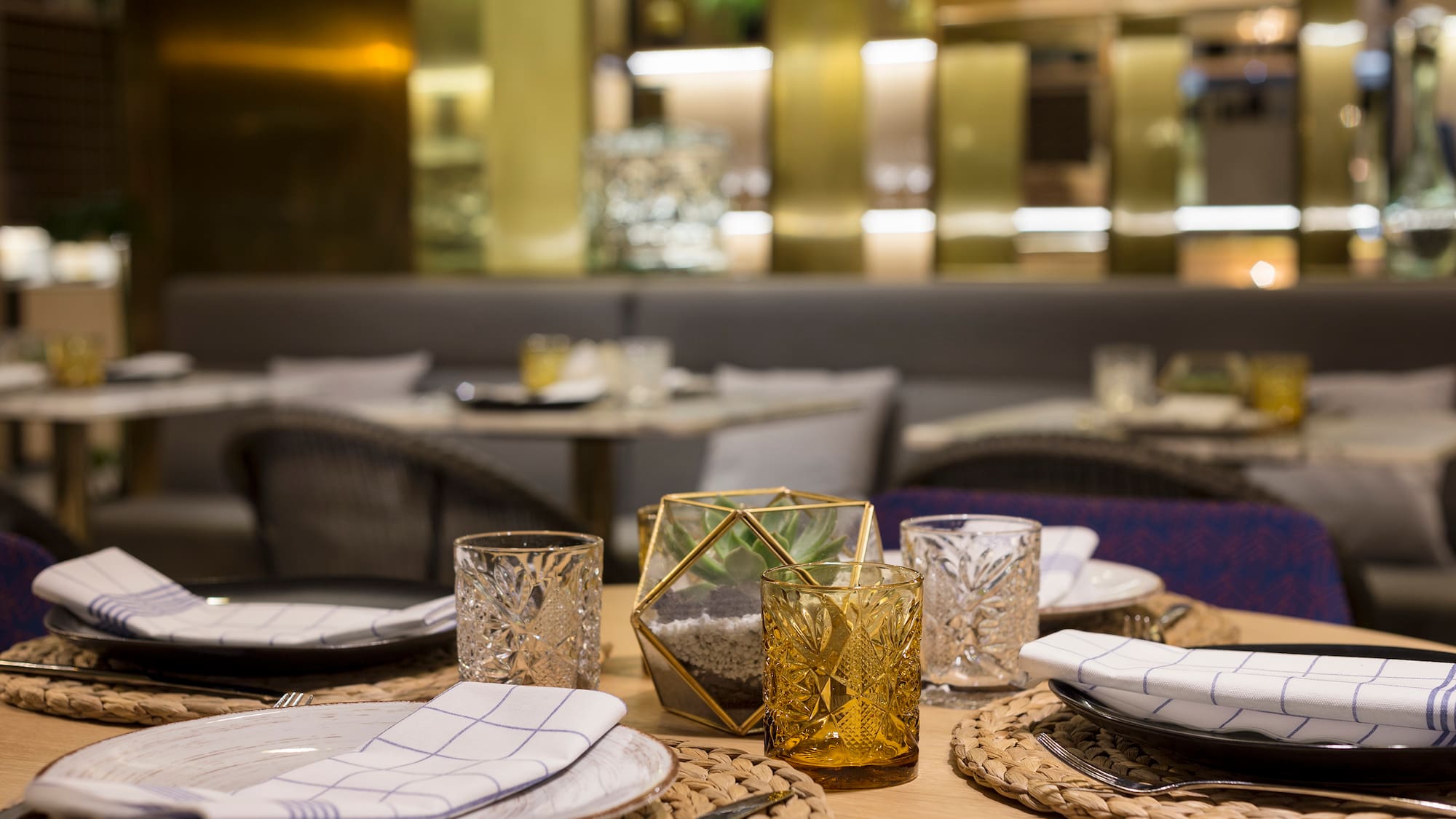 a table with plates and glasses on it