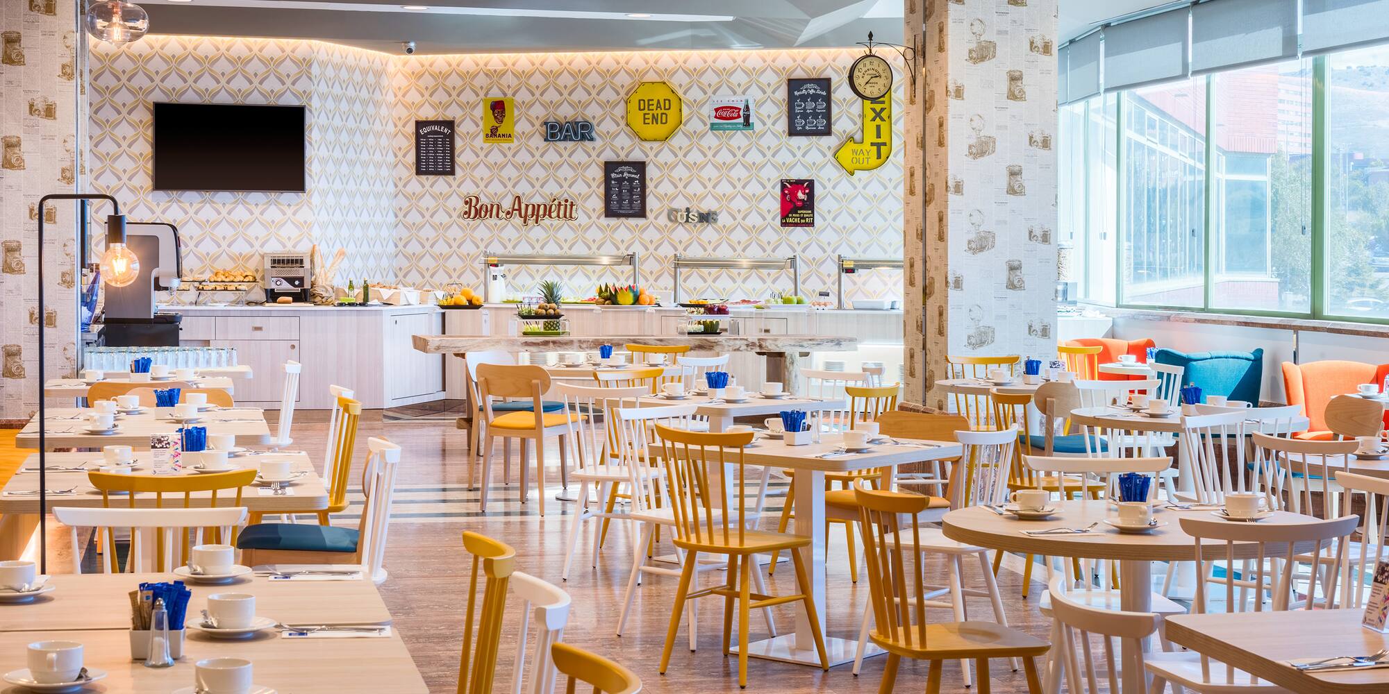 a room with tables and chairs