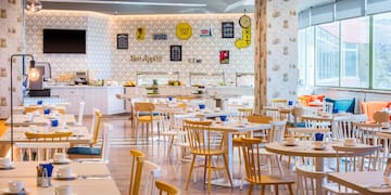 a room with tables and chairs