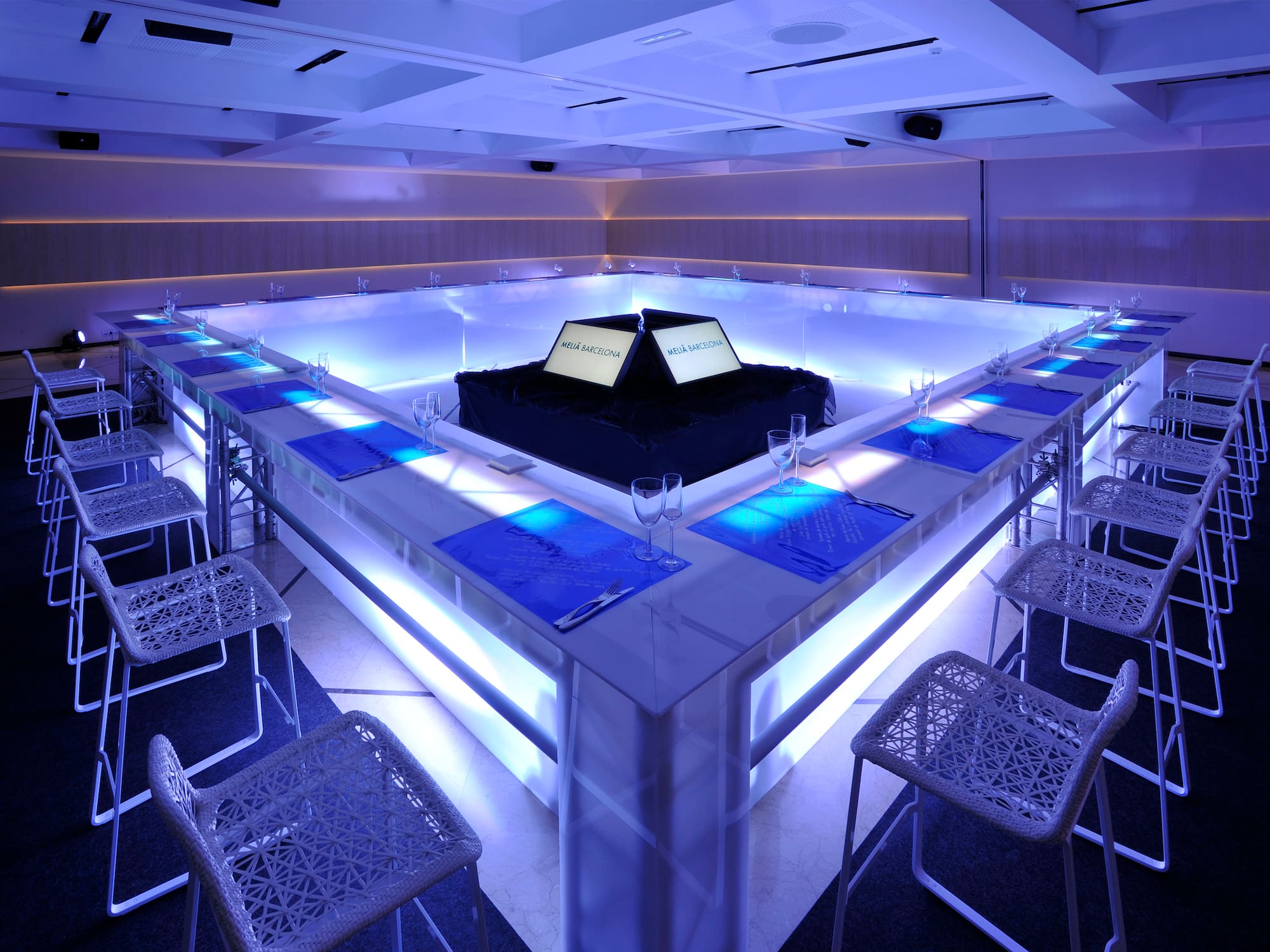 a room with a table and chairs