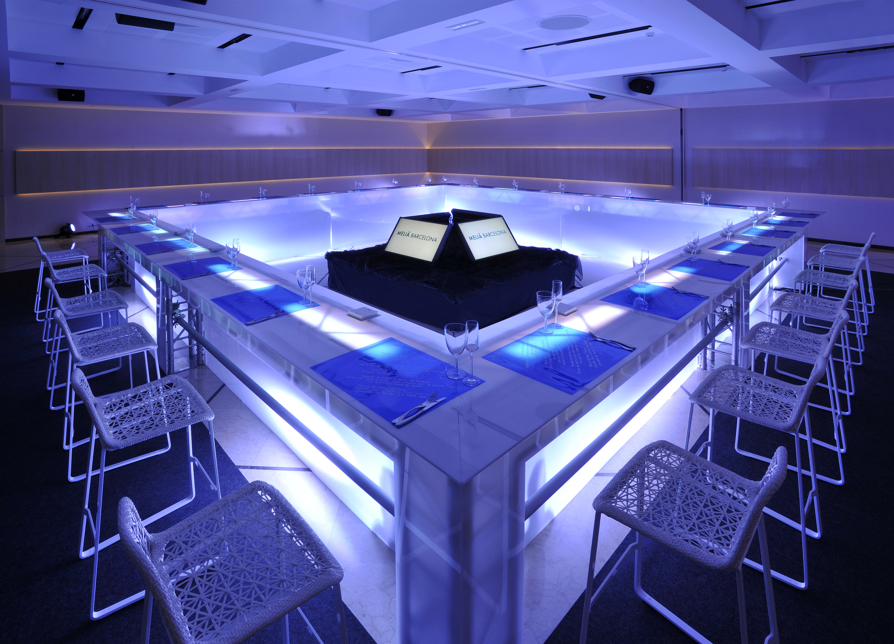 a room with a table and chairs