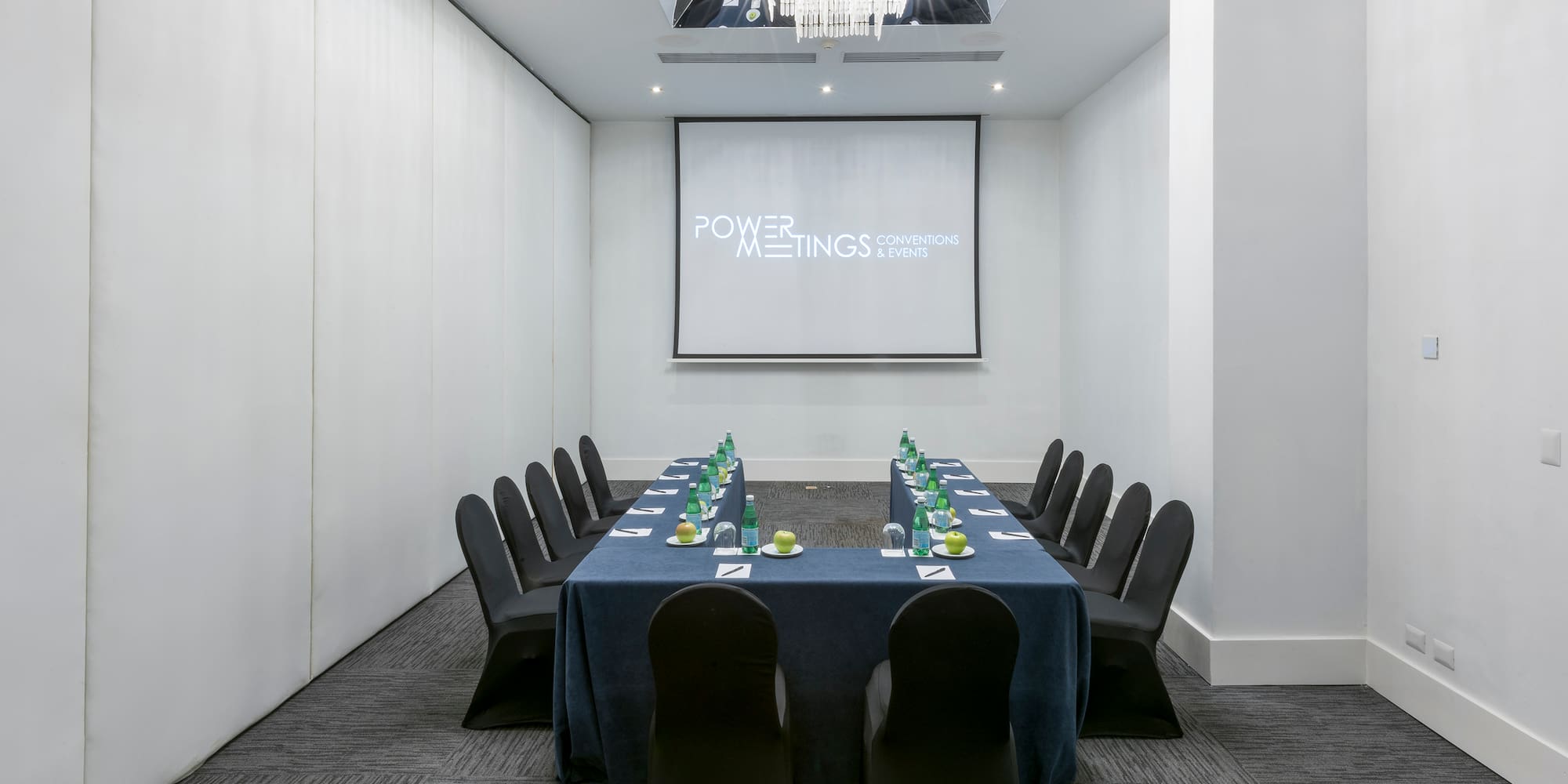 a room with a table and chairs