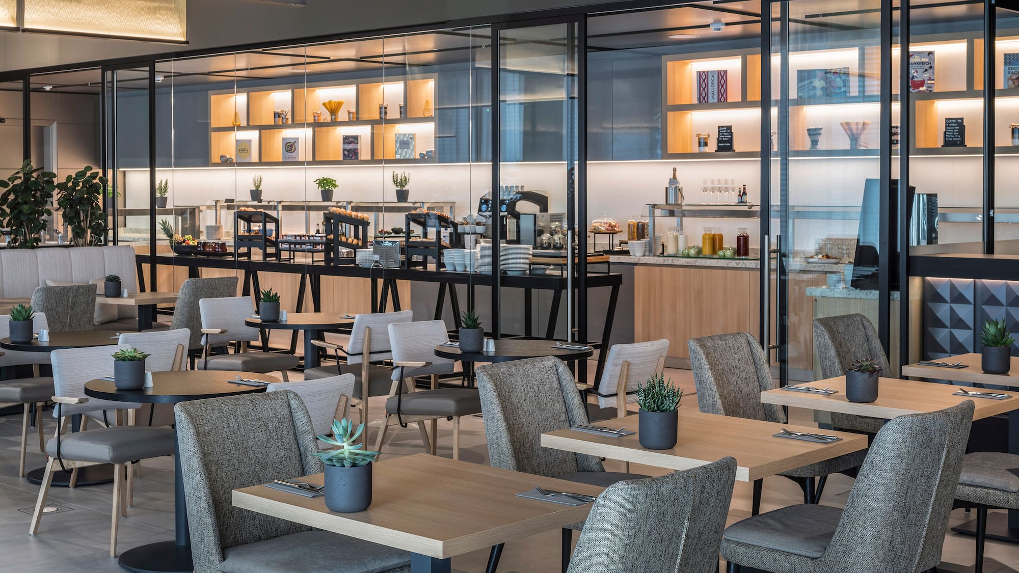 a restaurant with tables and chairs