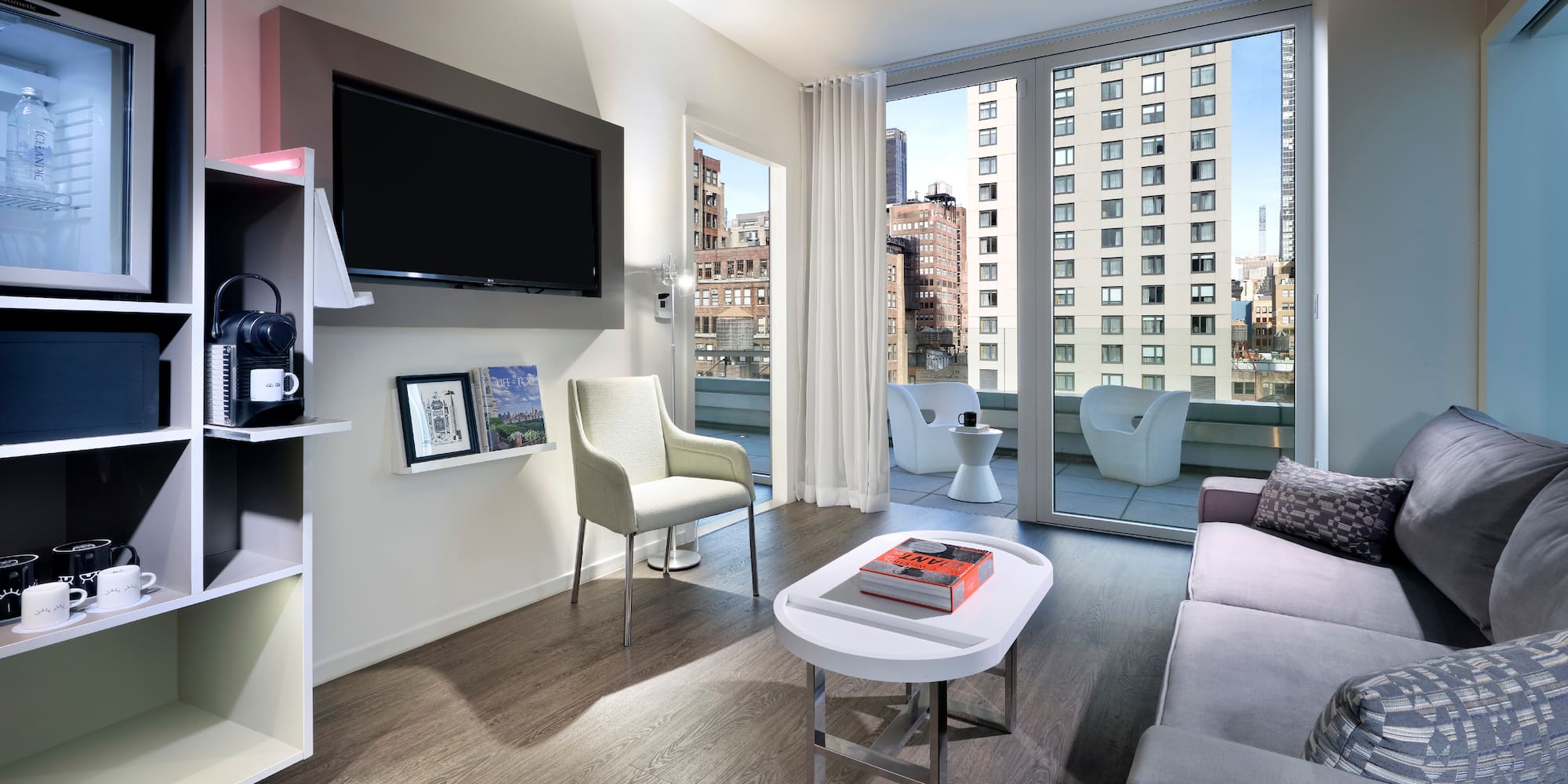 a living room with a television and a couch