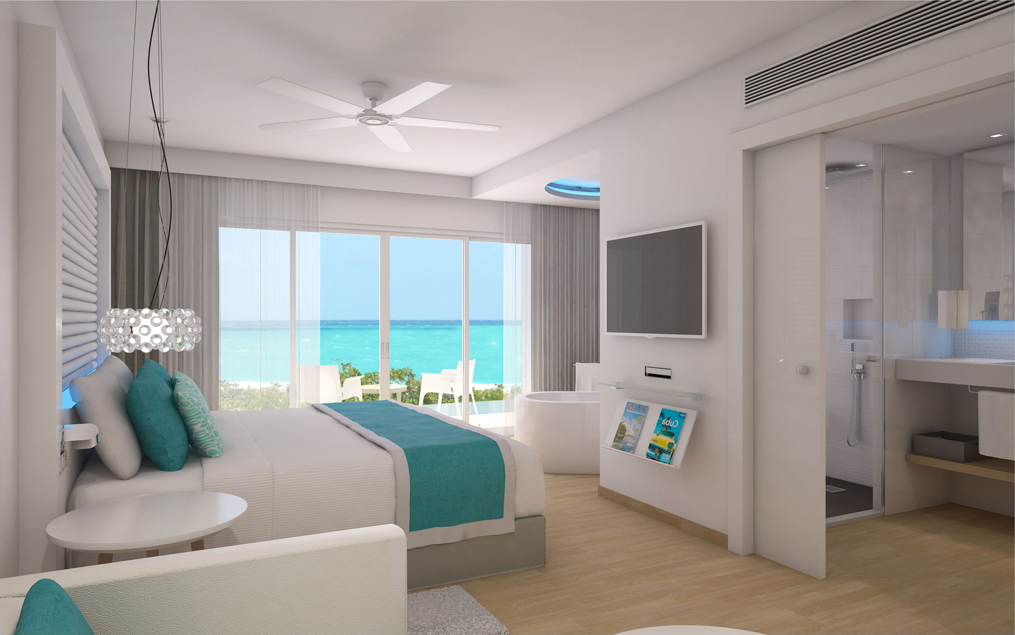 a bedroom with a television and a bathtub