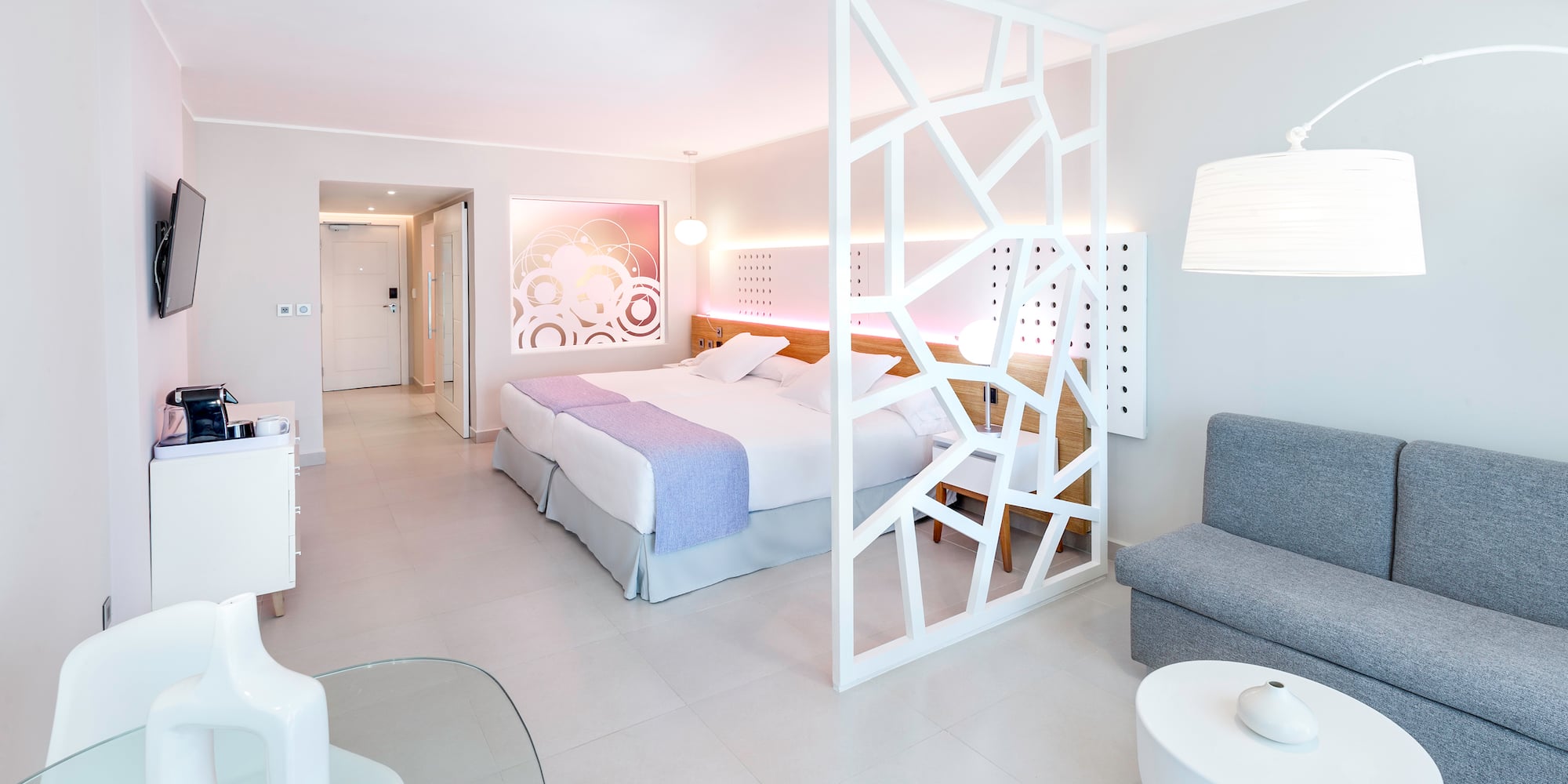 a room with a bed and a couch