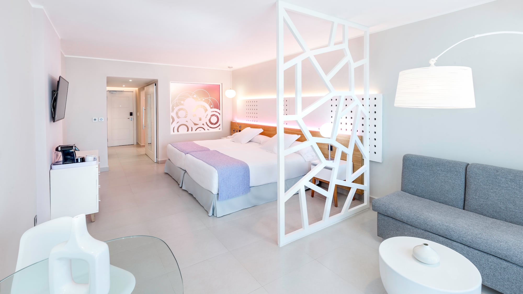 a room with a bed and a couch