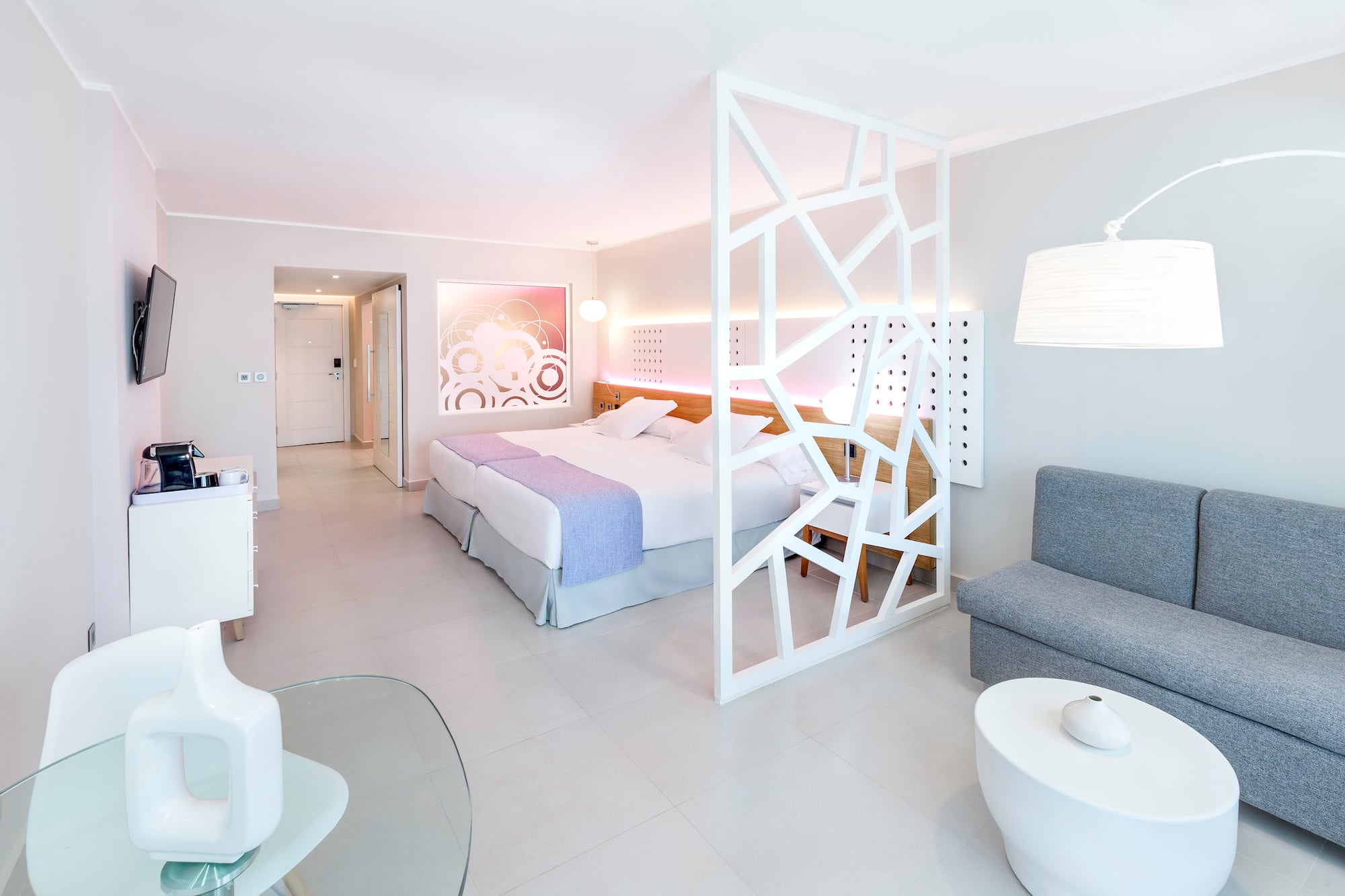 a room with a bed and a couch